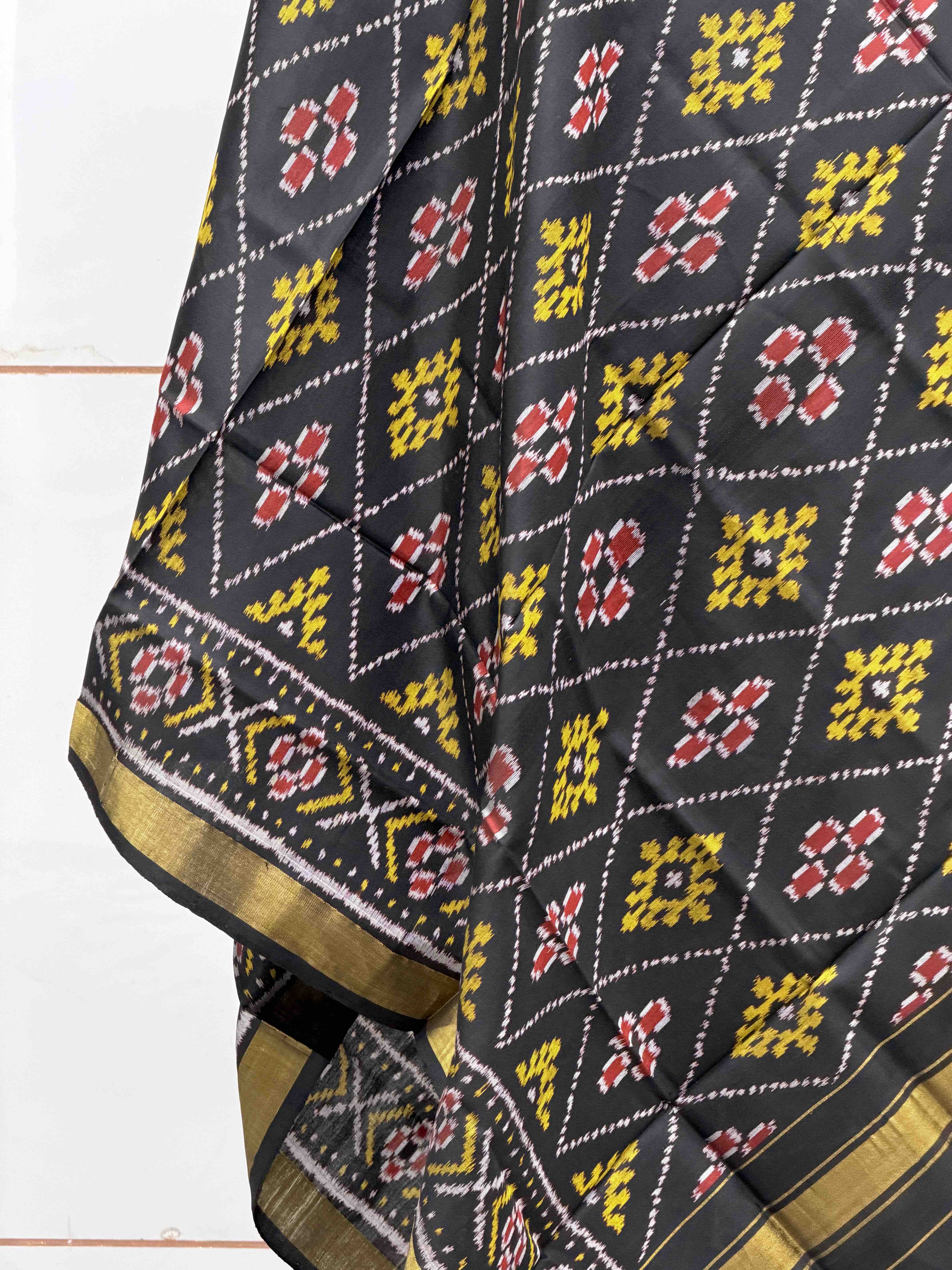 small dupatta in black shade panchanda design in single ikat