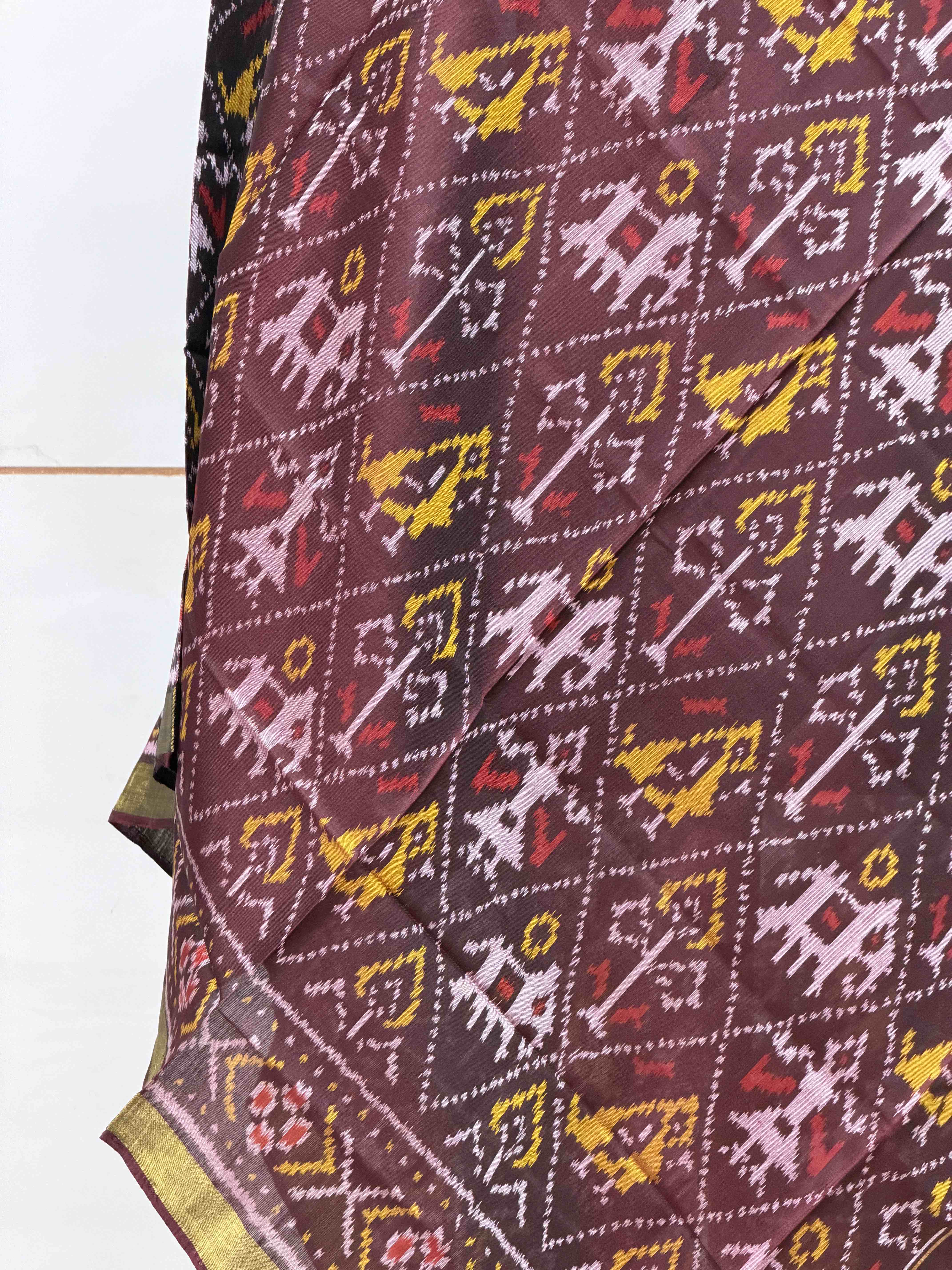 small dupatta in brown shade narikunj design single ikat woven