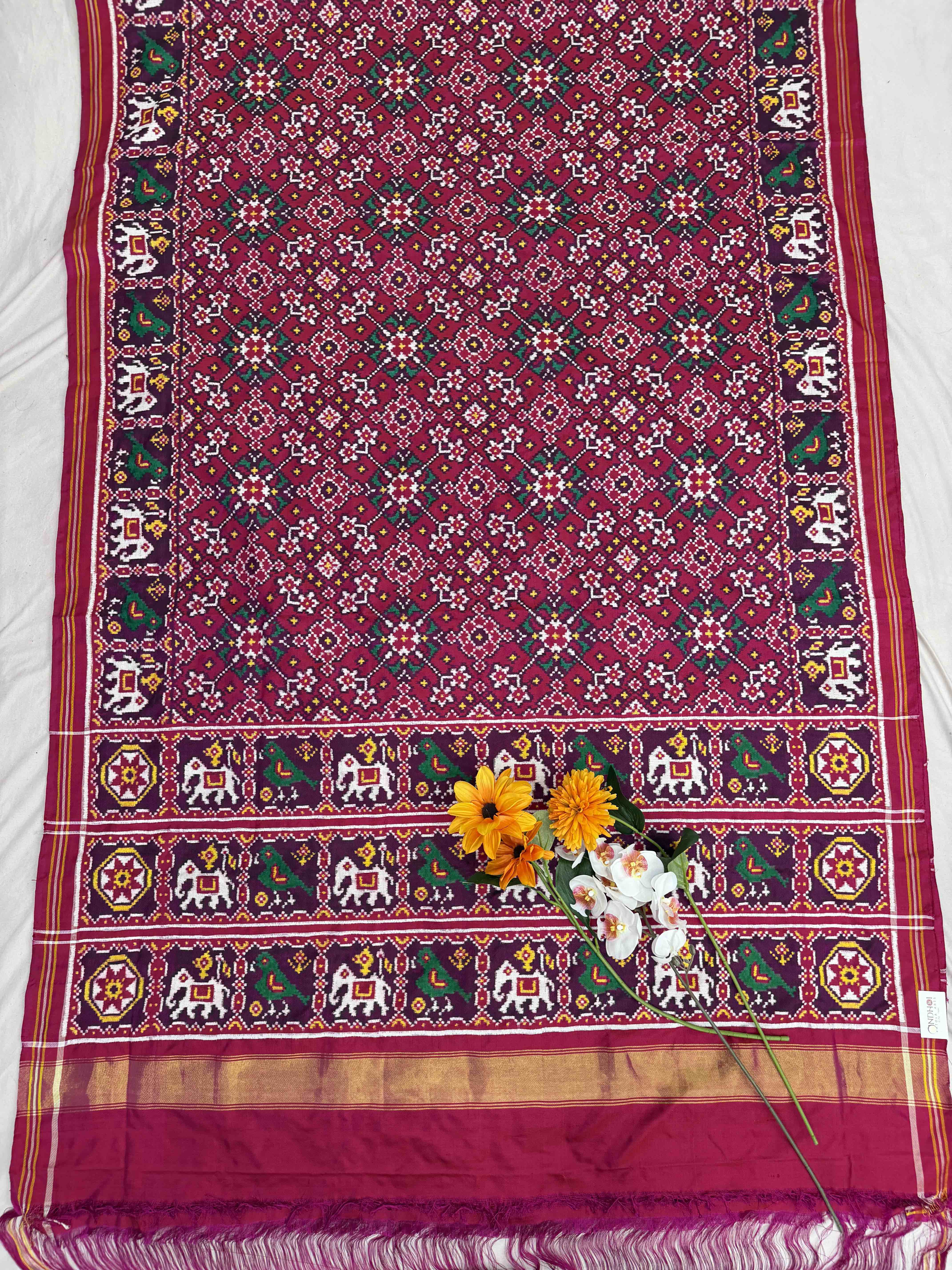 Sweet pink Navaratn Narikunj border Patan Patola