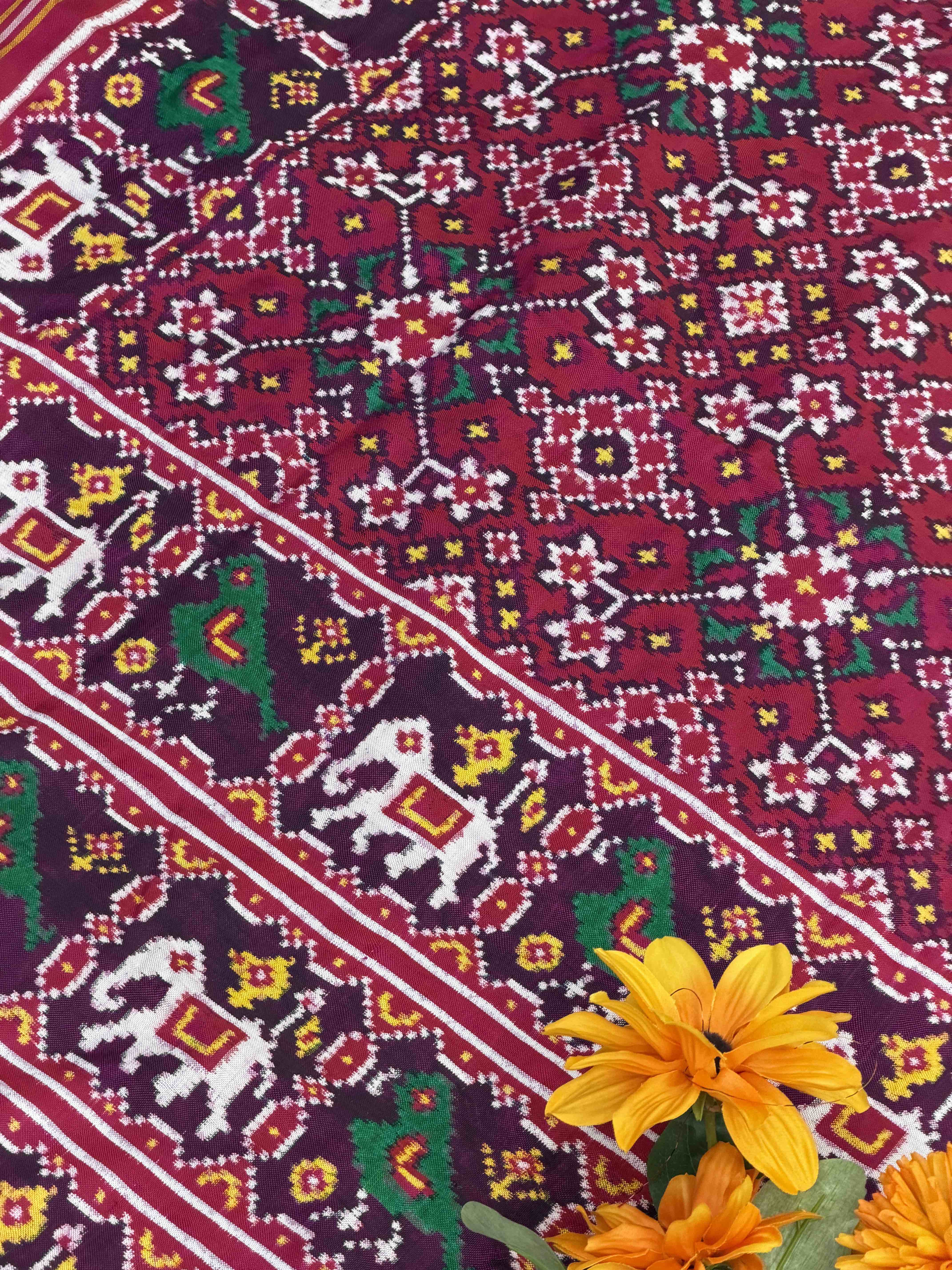 Sweet pink Navaratn Narikunj border Patan Patola