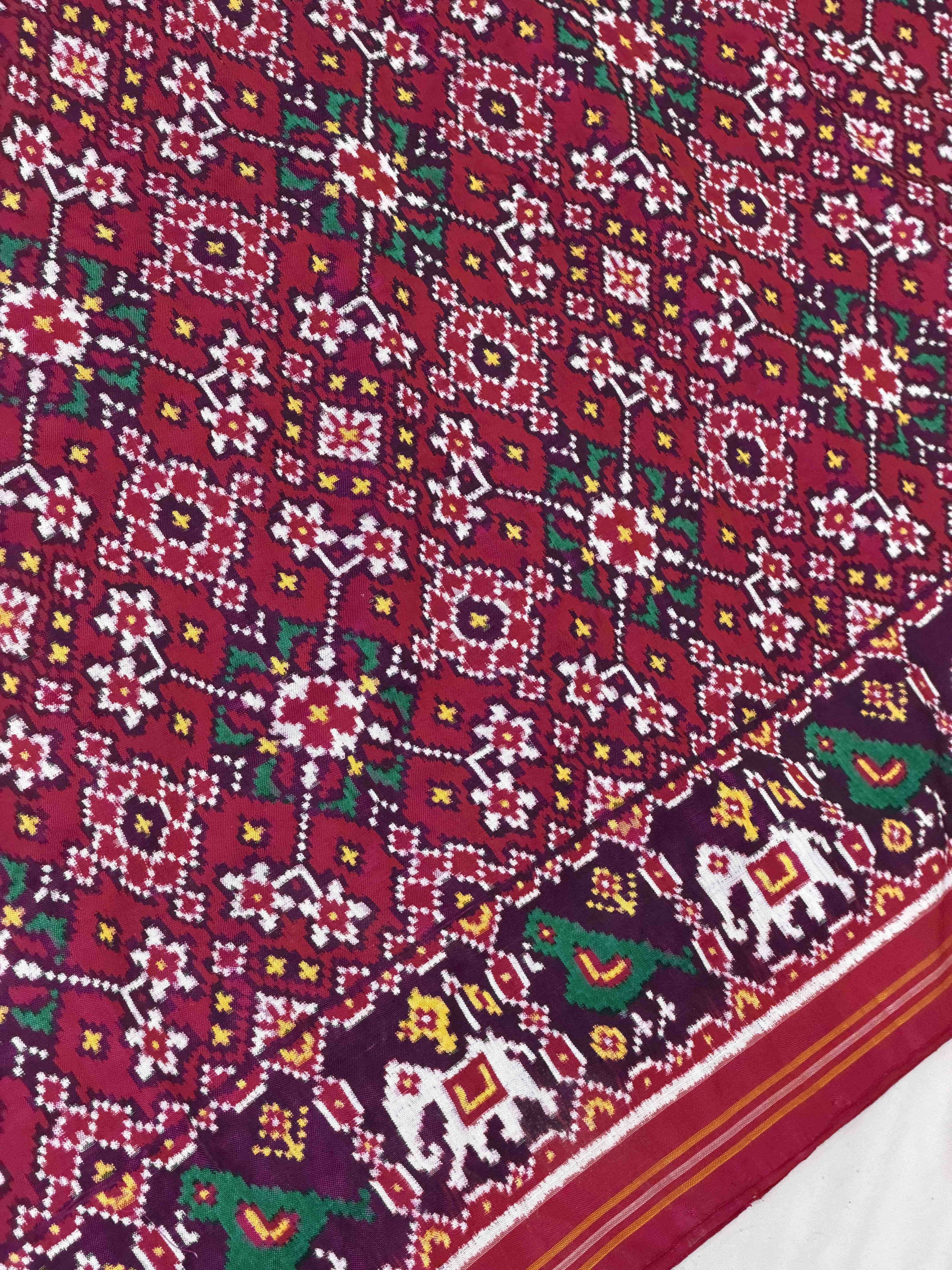 Sweet pink Navaratn Narikunj border Patan Patola
