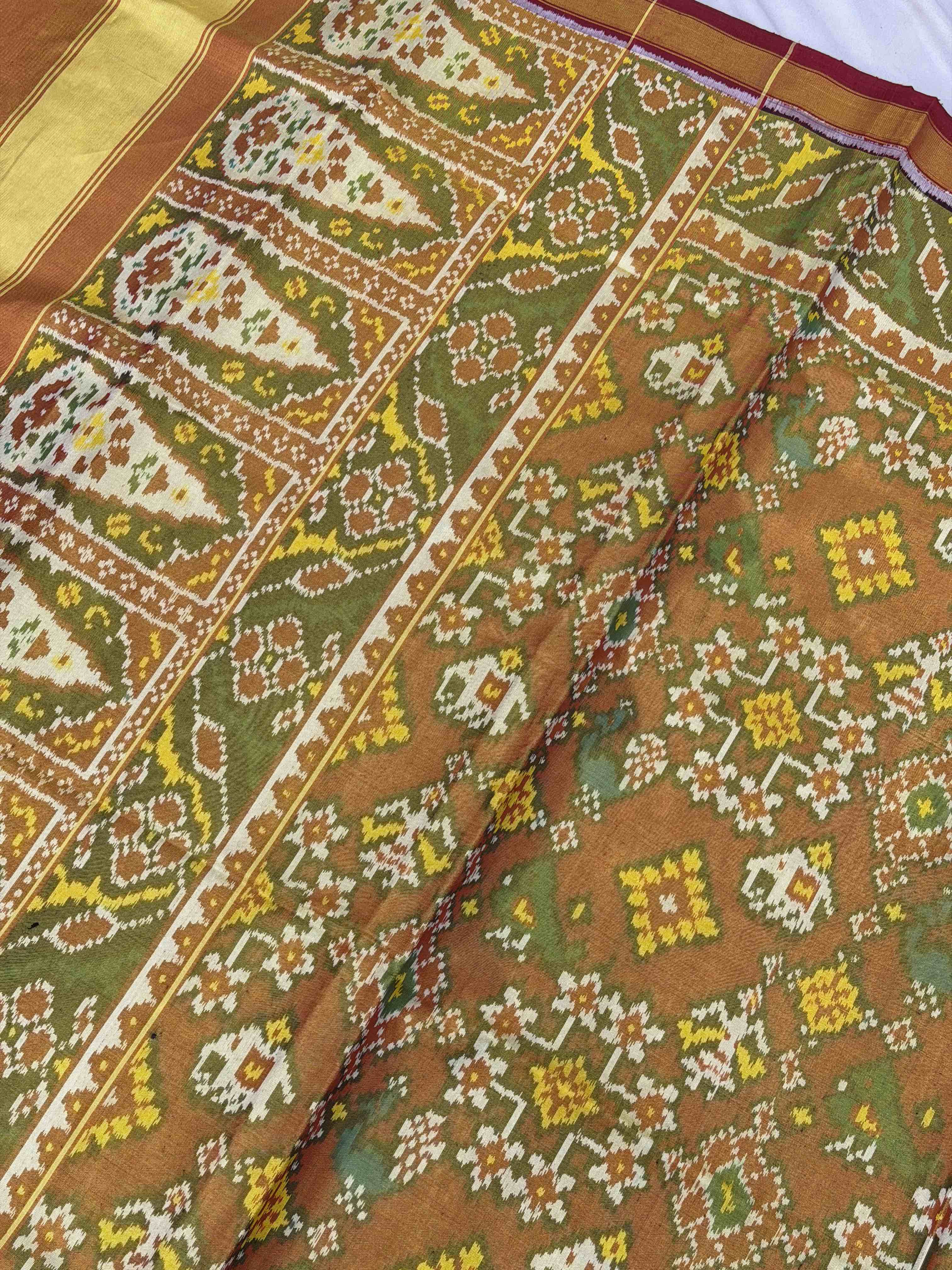 Maroon Golden Tissue Narikunj Navaratn tissue Patola