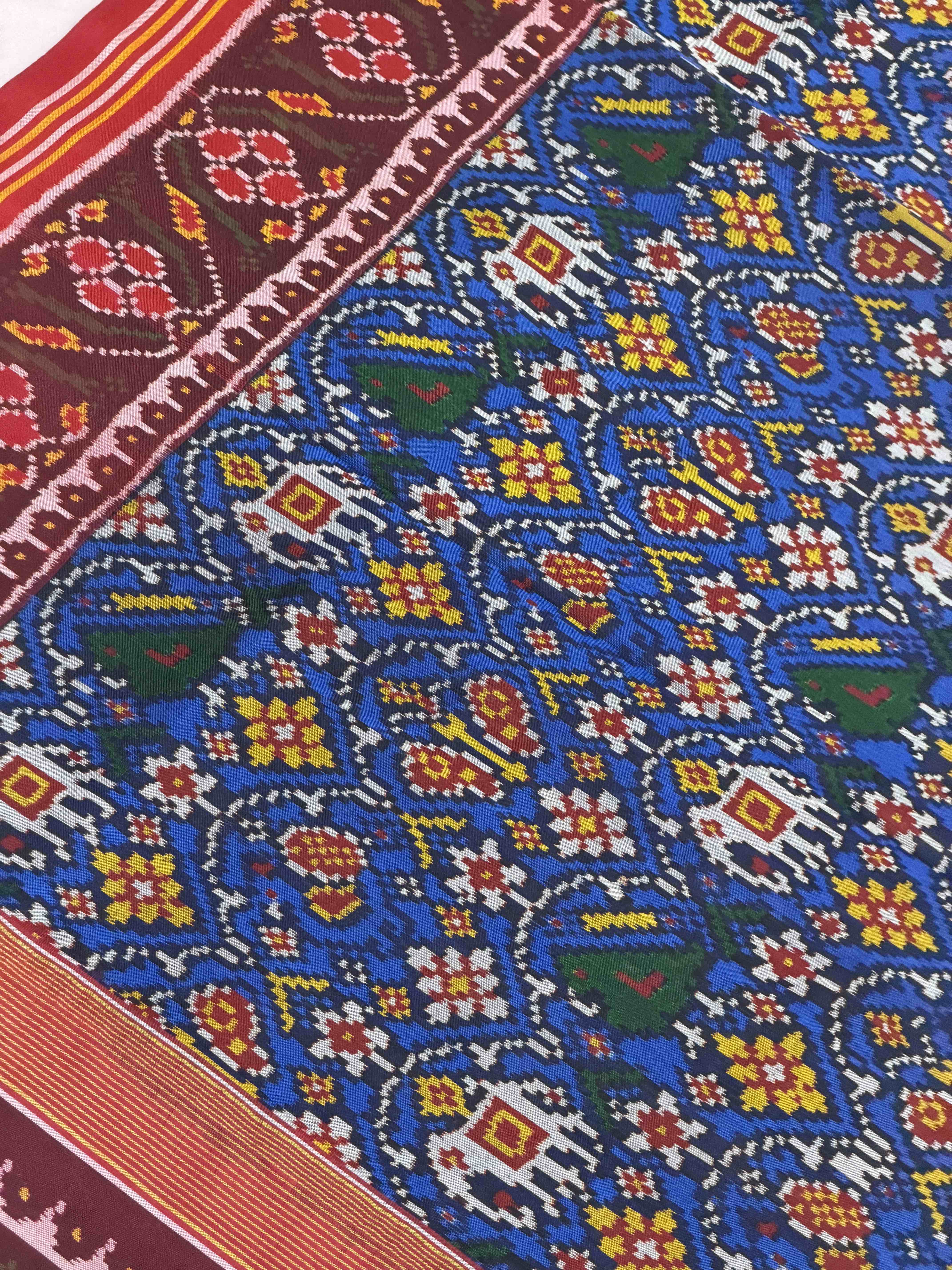 Maroon & Blue floral figure single ikat Patola