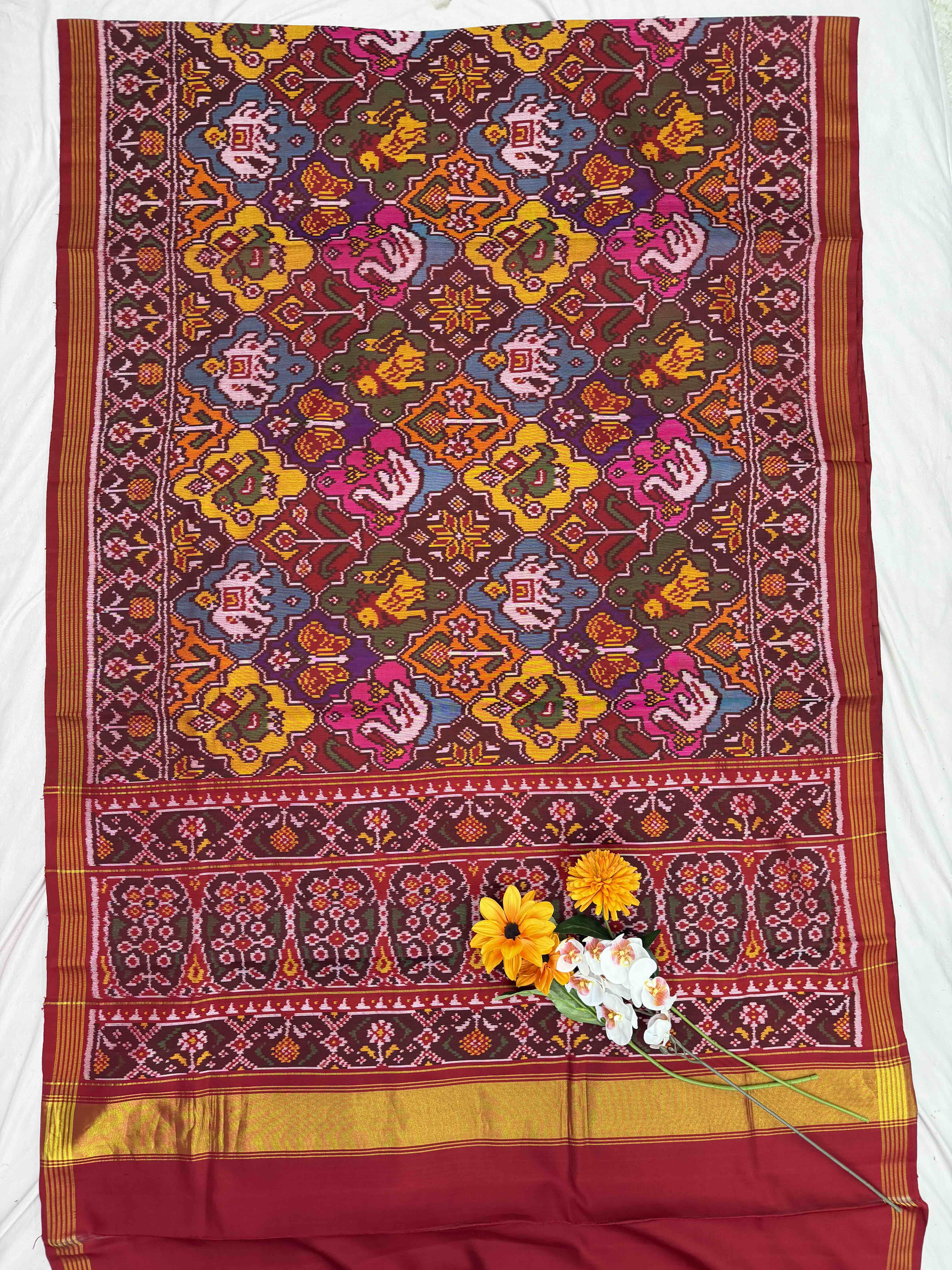 Maroon with multi figure & multi colour Patola Saree