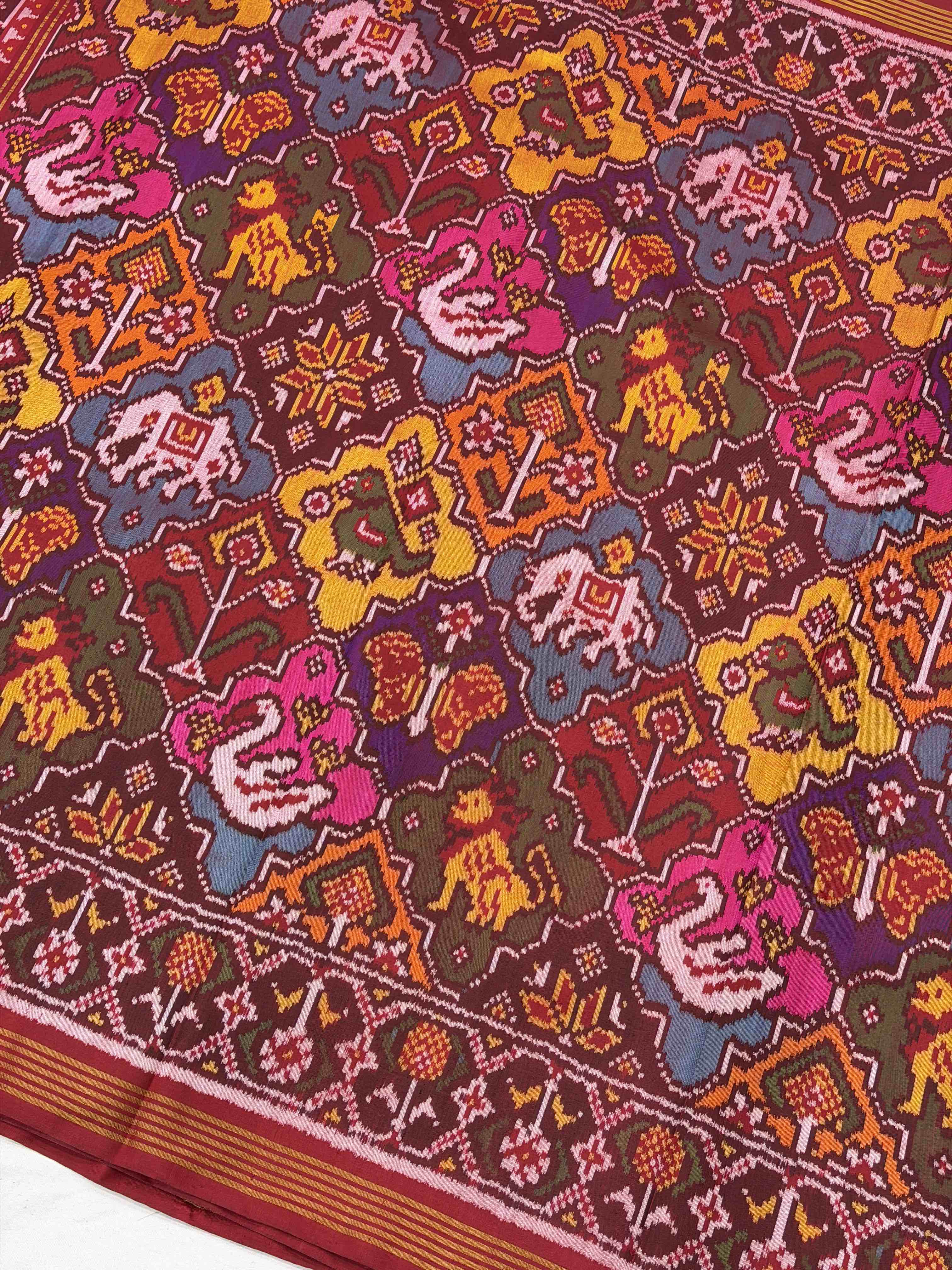 Maroon with multi figure & multi colour Patola Saree
