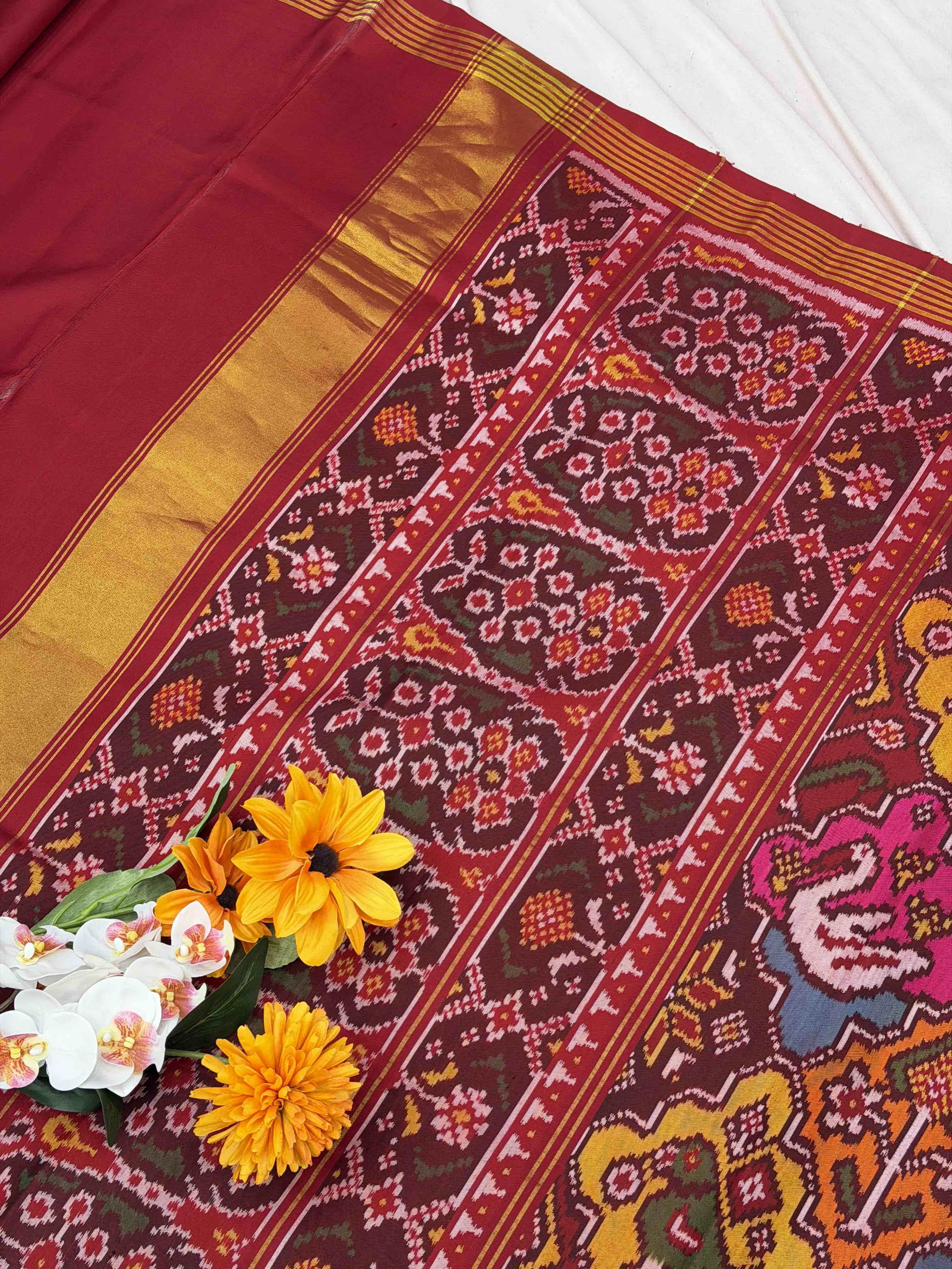 Maroon with multi figure & multi colour Patola Saree