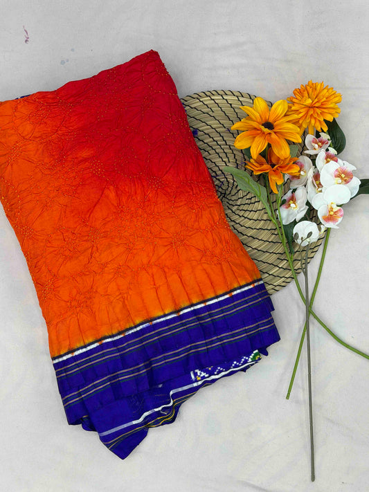 Blue with combination of Red & orange double ikat Patola with Bandhani