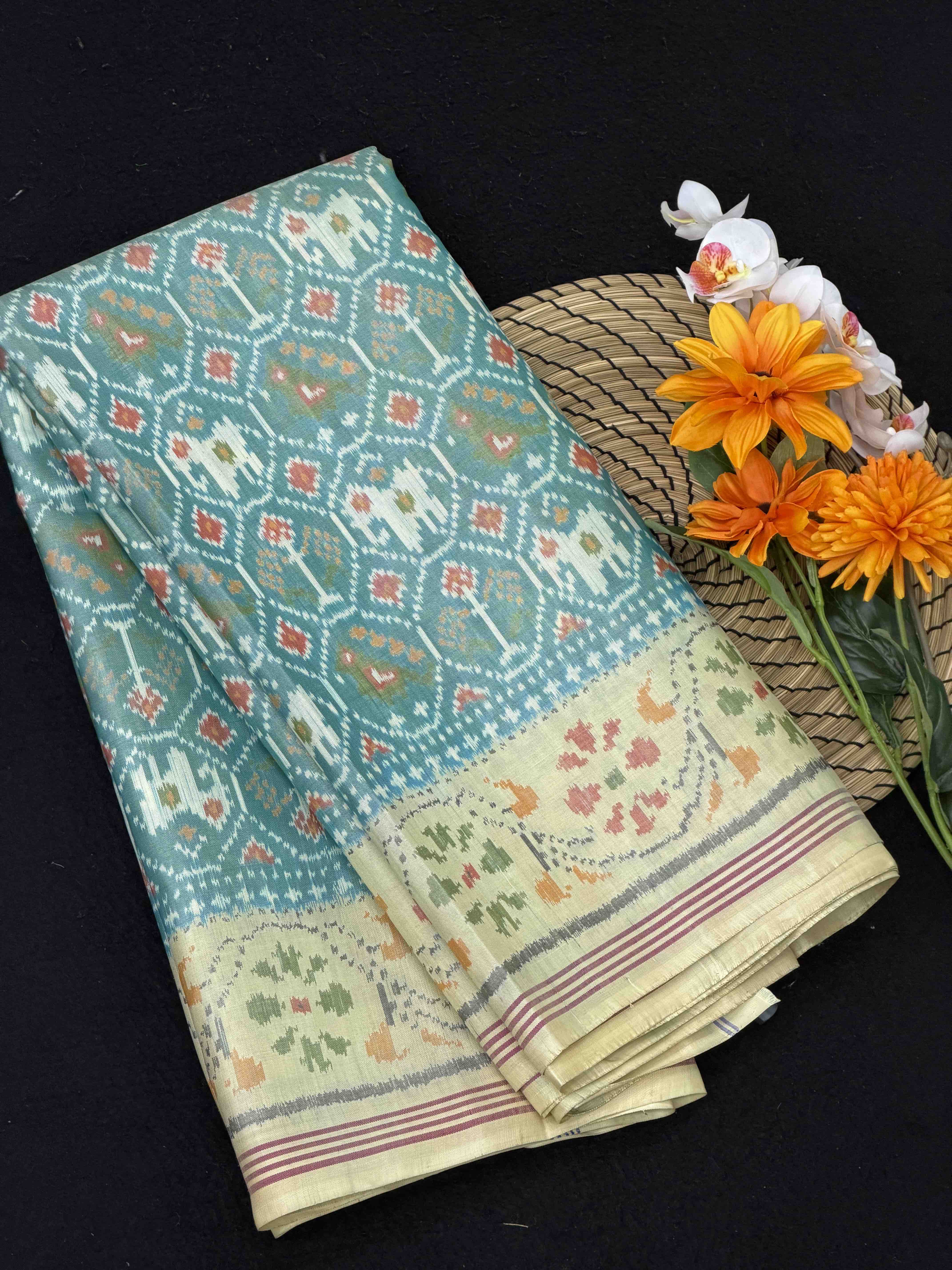 Off white & light Sea Green Narikunj Singe Ikat Patola Sarees