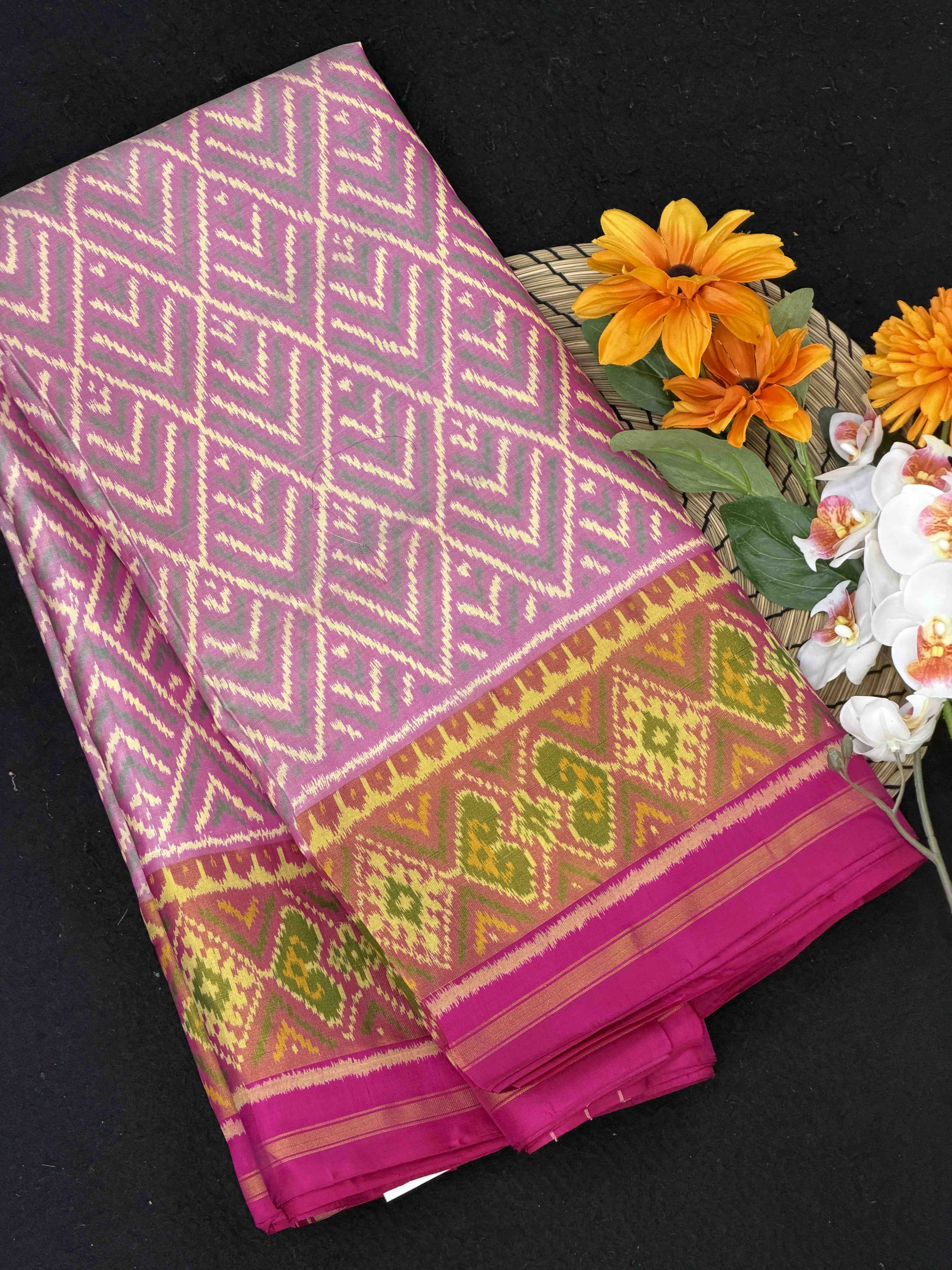 Rani & Light pink Fancy designs Rajkot Patola Saree