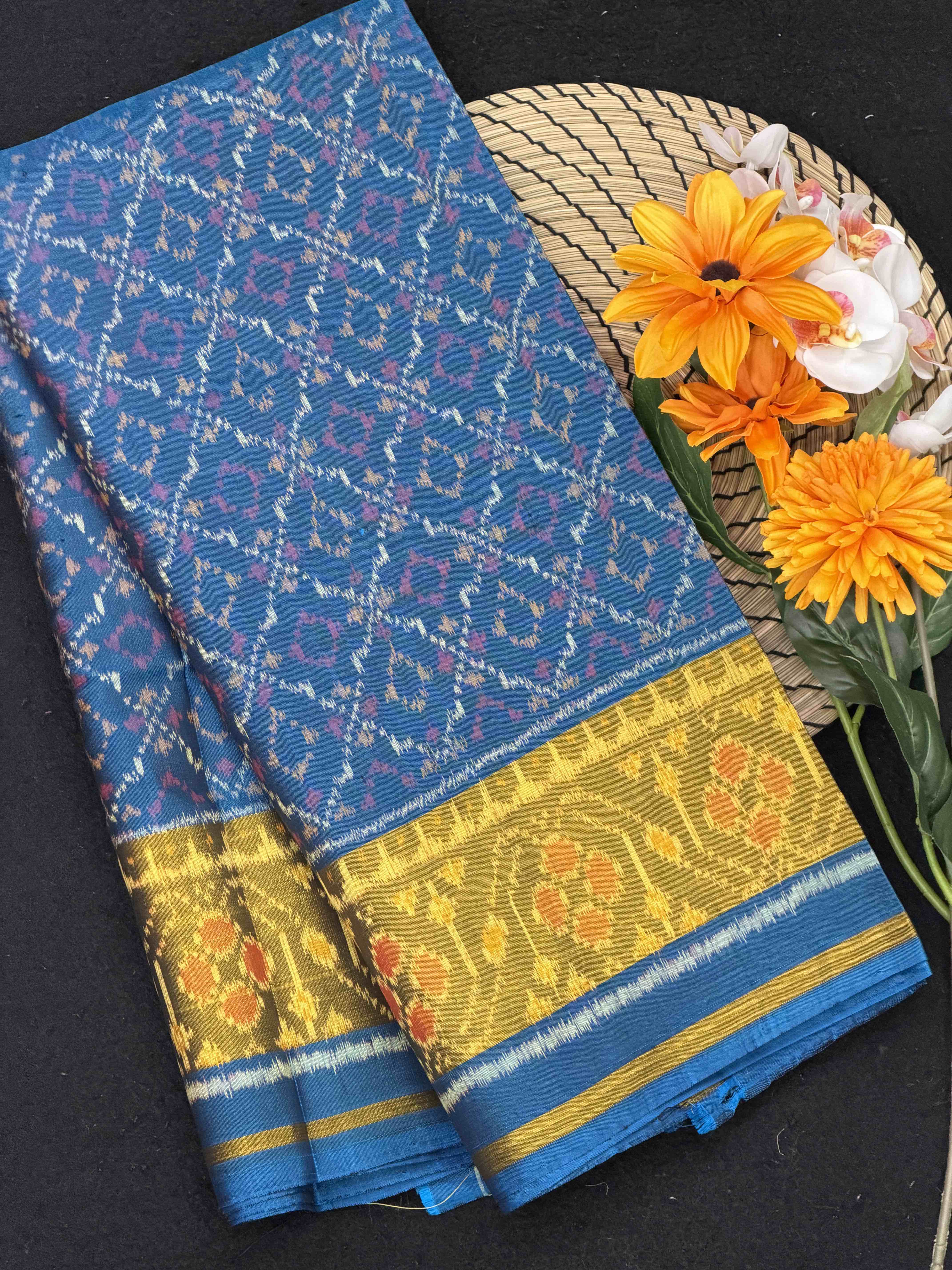 Light blue shade buttonful Rajkoti Patola Saree