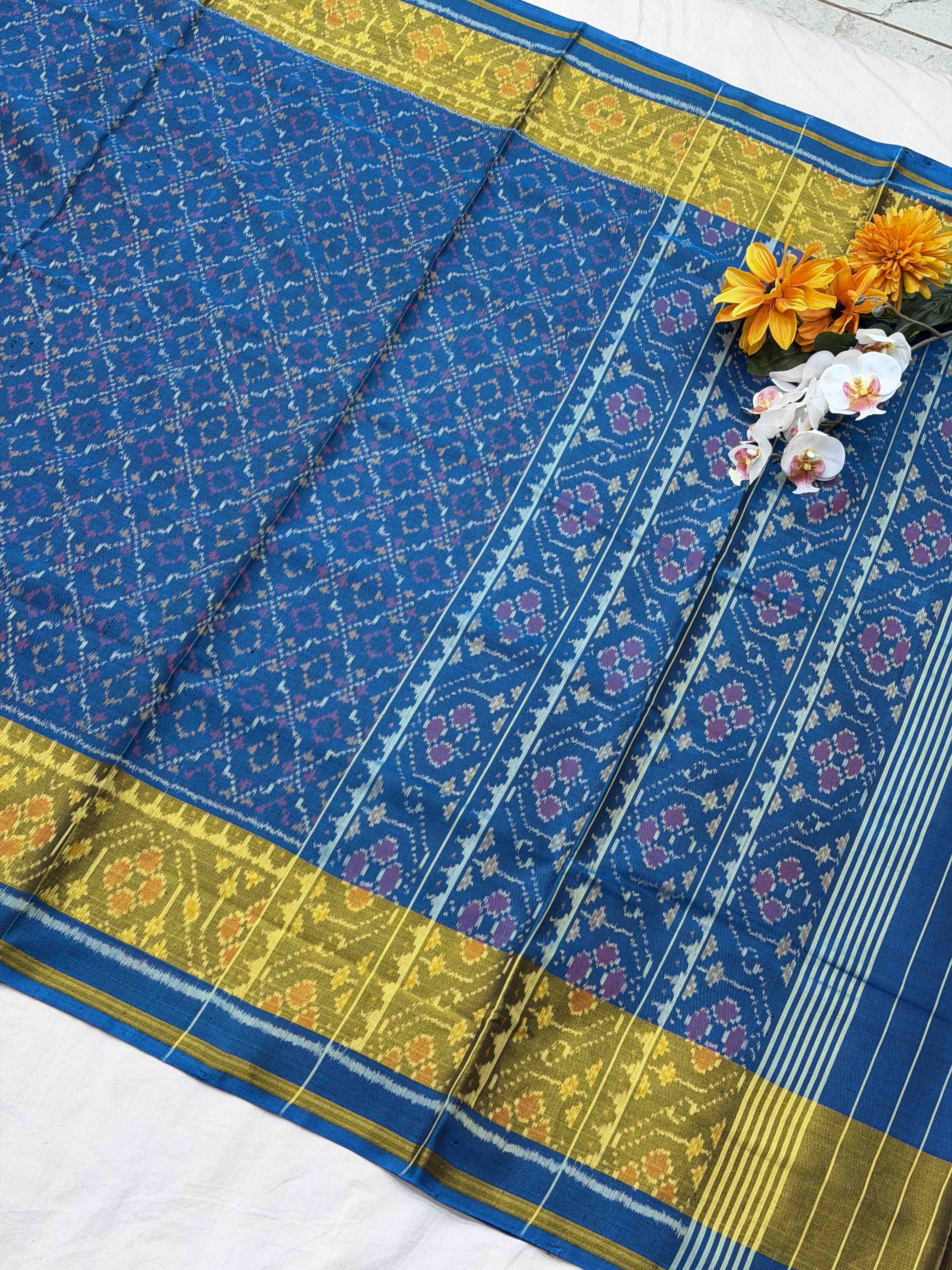 Light blue shade buttonful Rajkoti Patola Saree