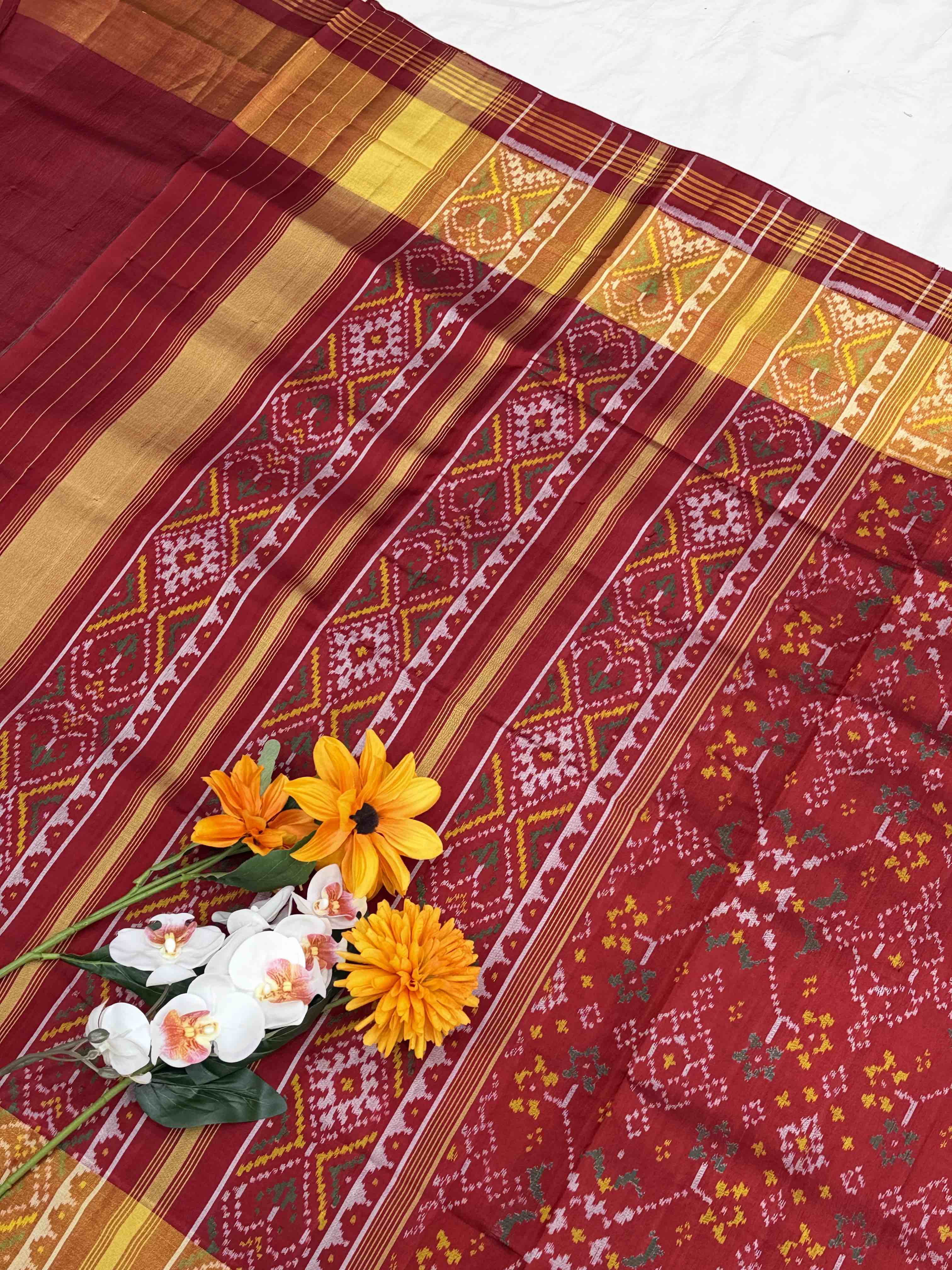 Red navaratan tissue border Patola Saree