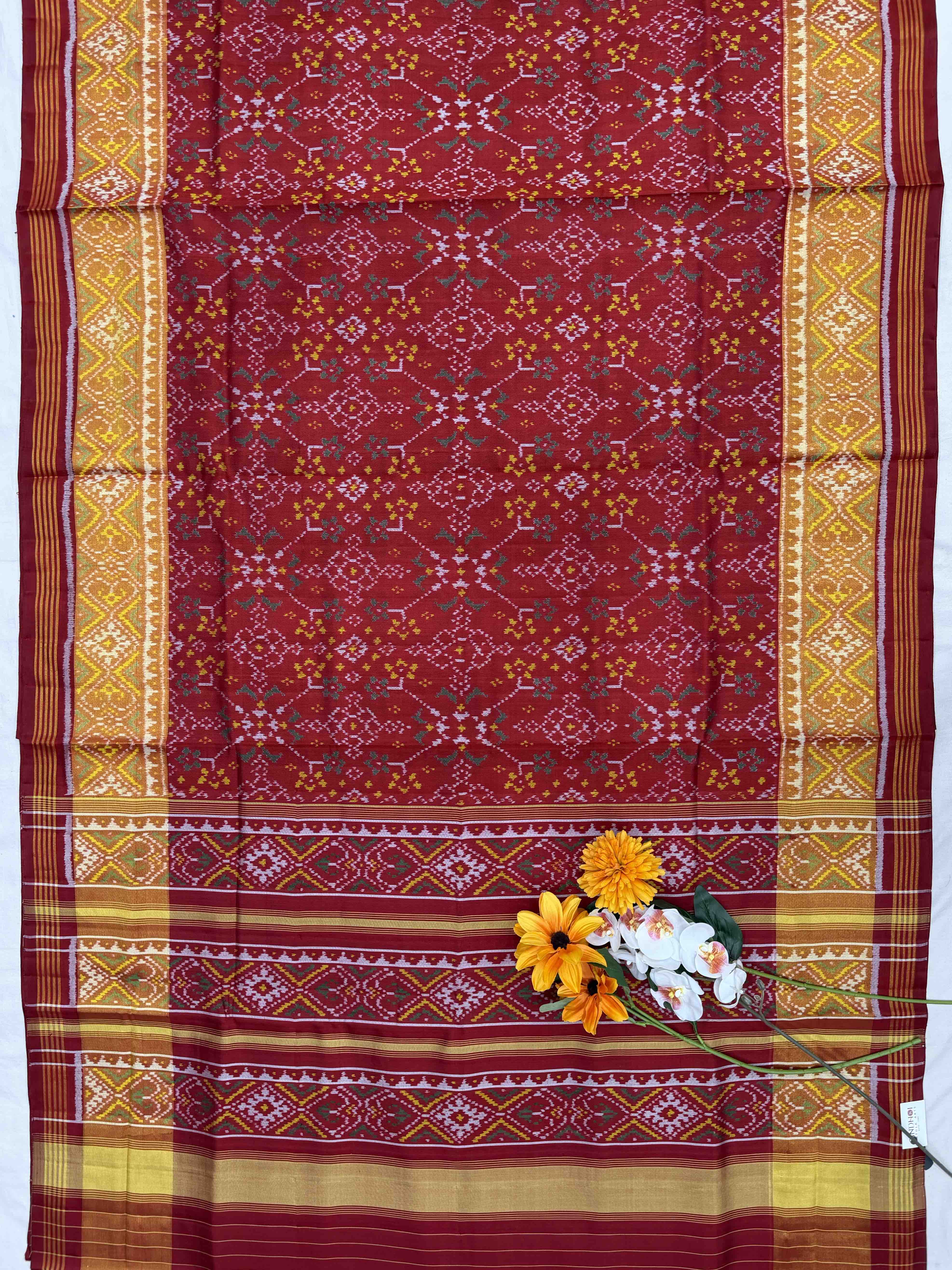 Red navaratan tissue border Patola Saree