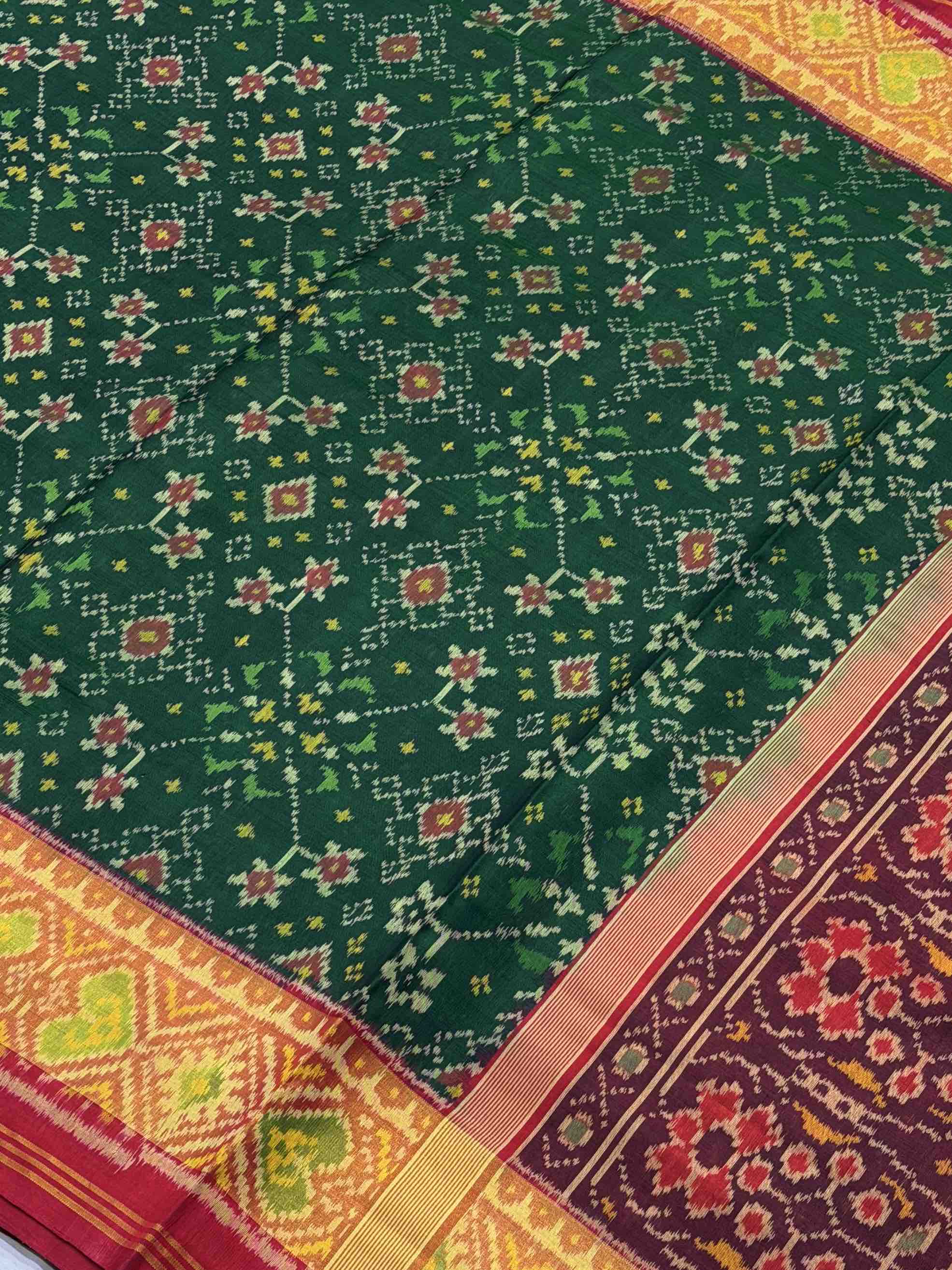 Maroon & Green Navaratan tissue Border Patola Saree