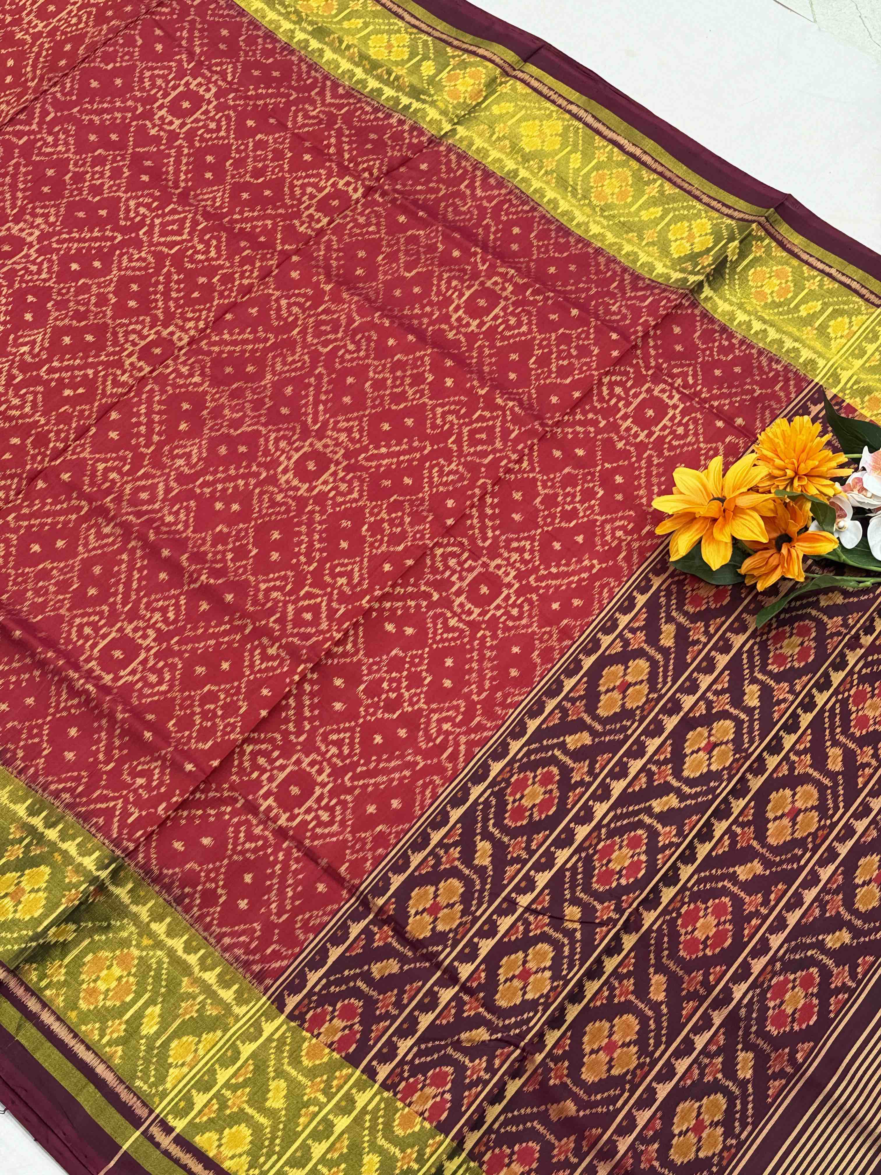 Wine & Gajari manekchawk Tissue border patola Saree