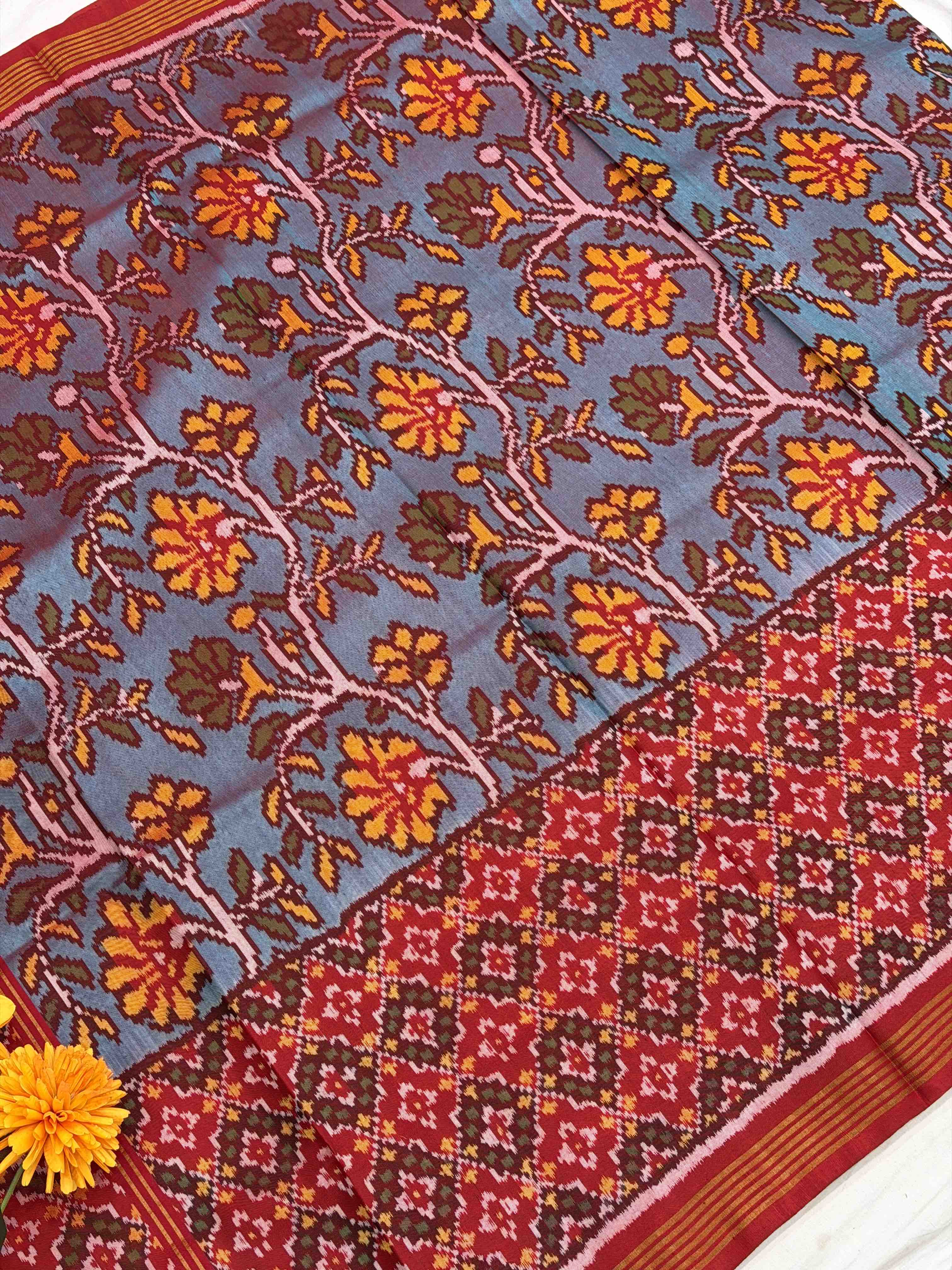 Red & teal skirt border button ful single ikat patola saree
