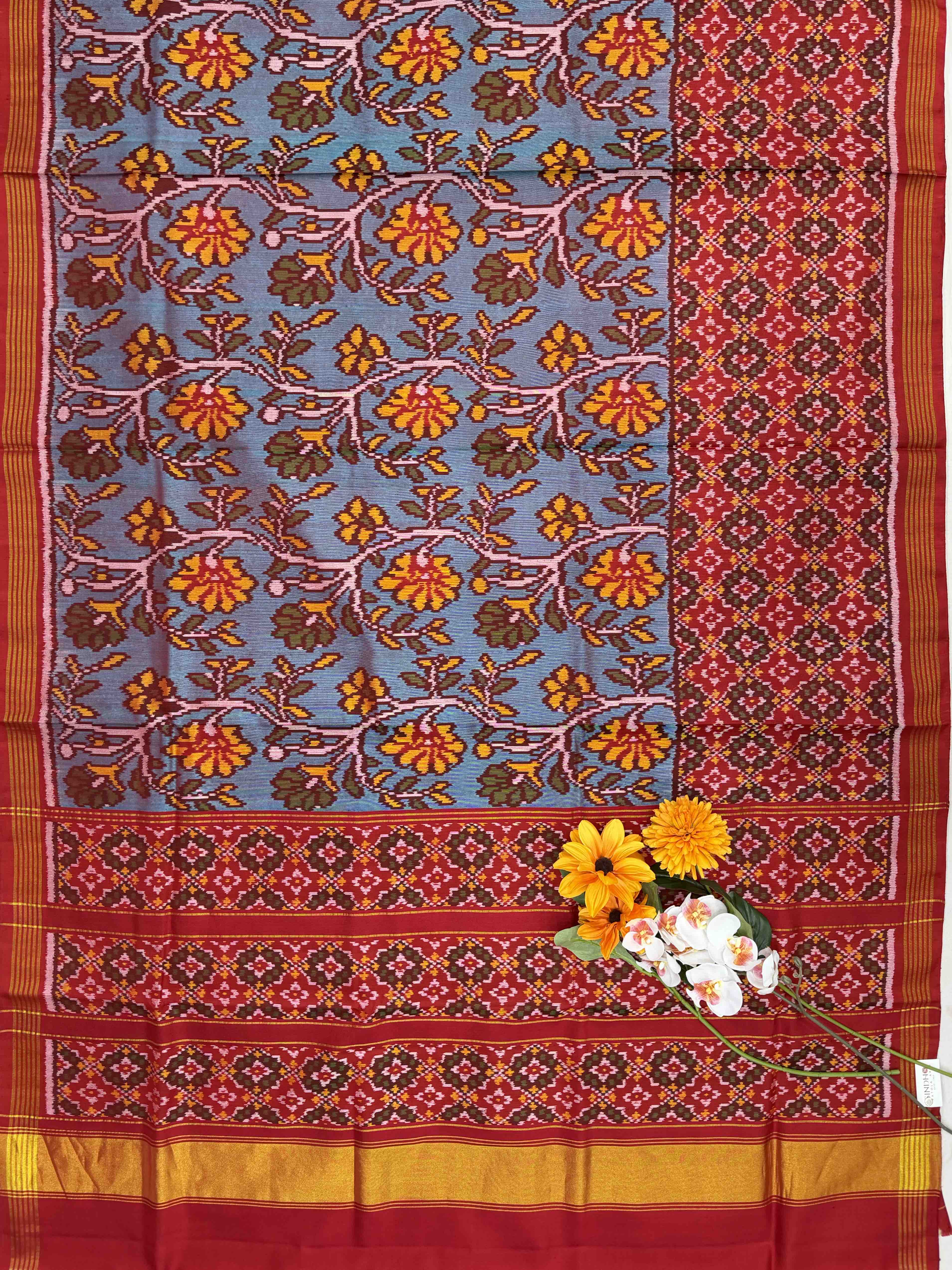Red & teal skirt border button ful single ikat patola saree