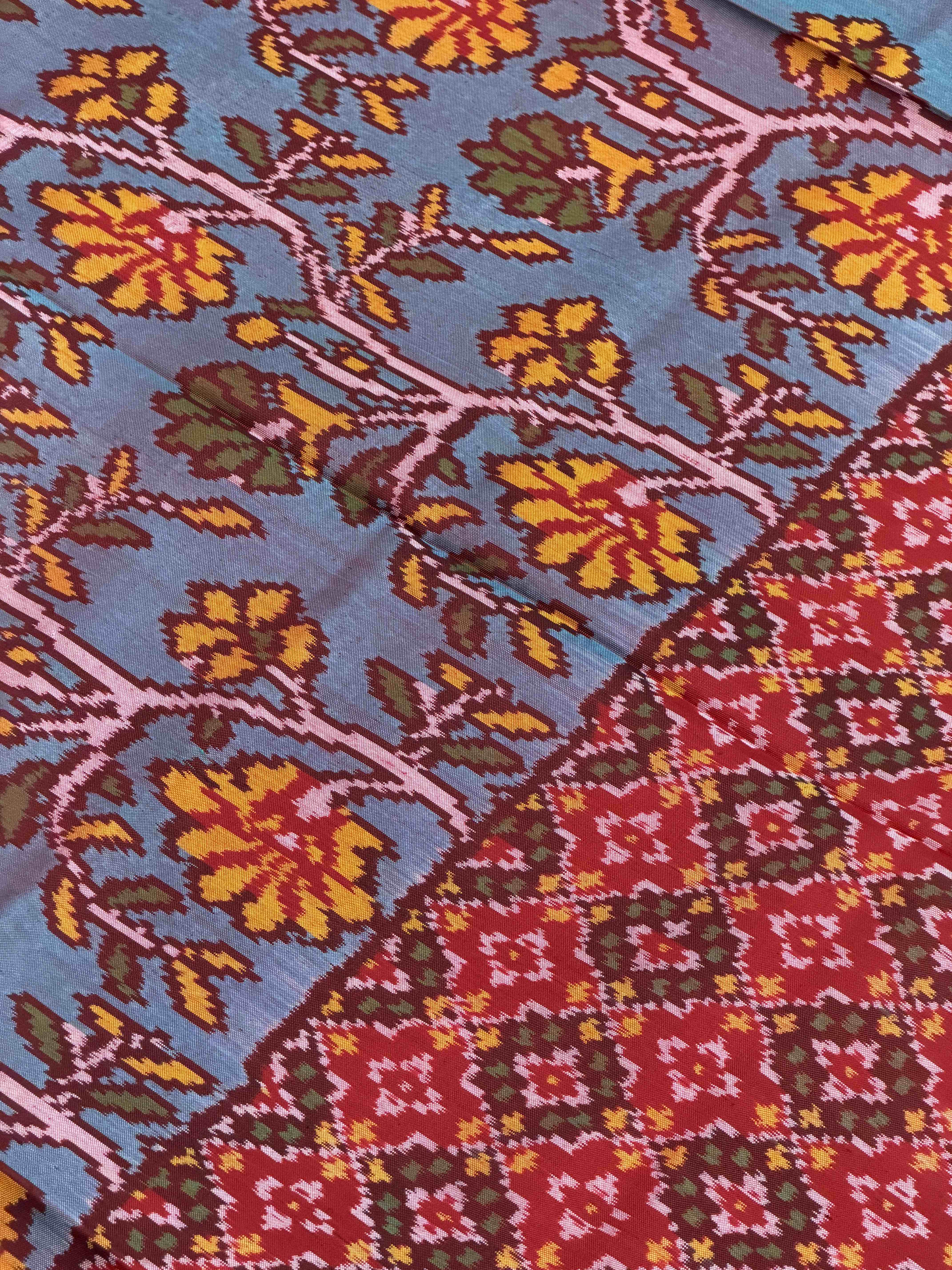 Red & teal skirt border button ful single ikat patola saree