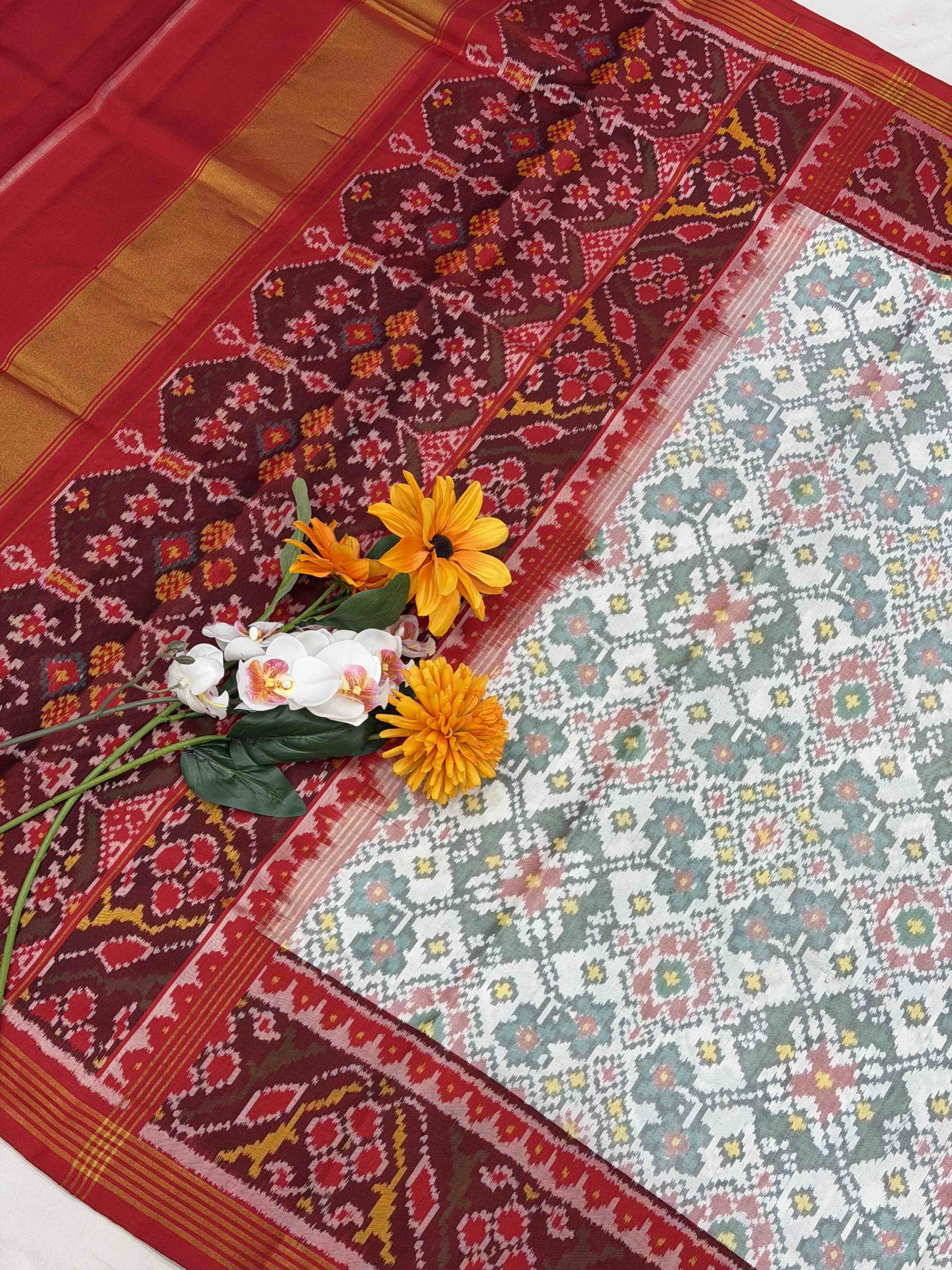 Red & white navaratan single ikat Patola saree