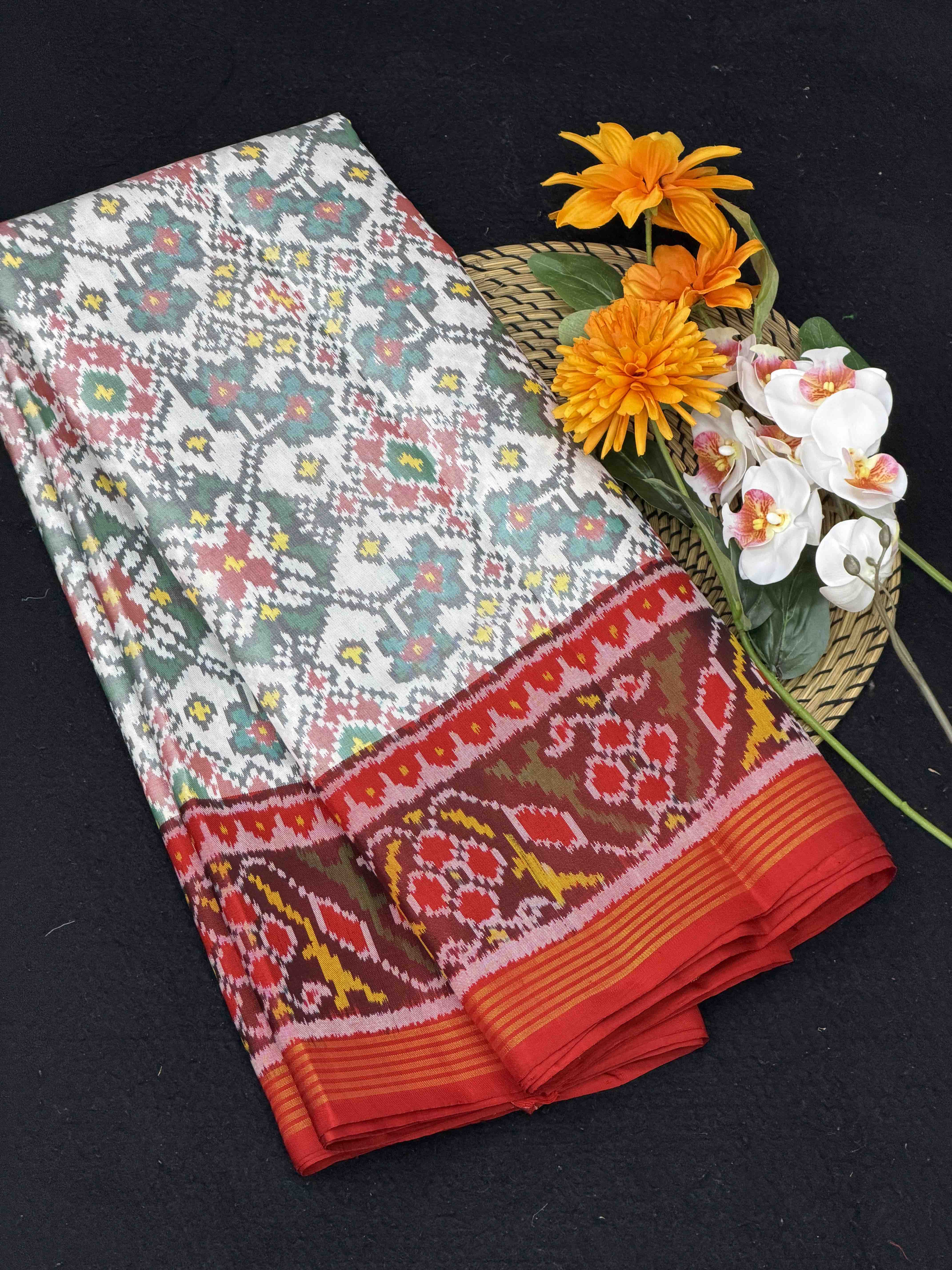 Red & white navaratan single ikat Patola saree