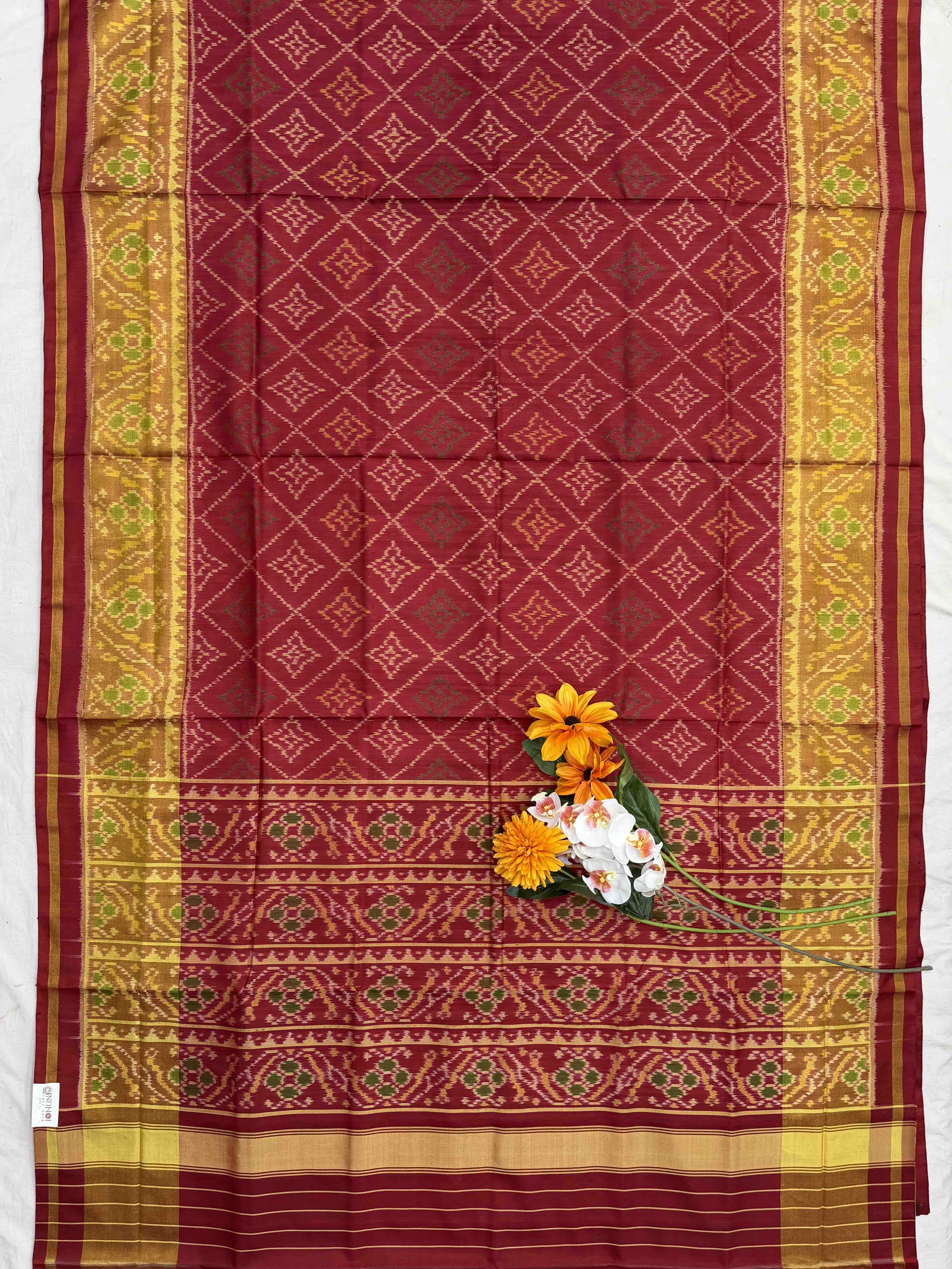 Maroonish red Chokhtabhat Rajkot Patola saree