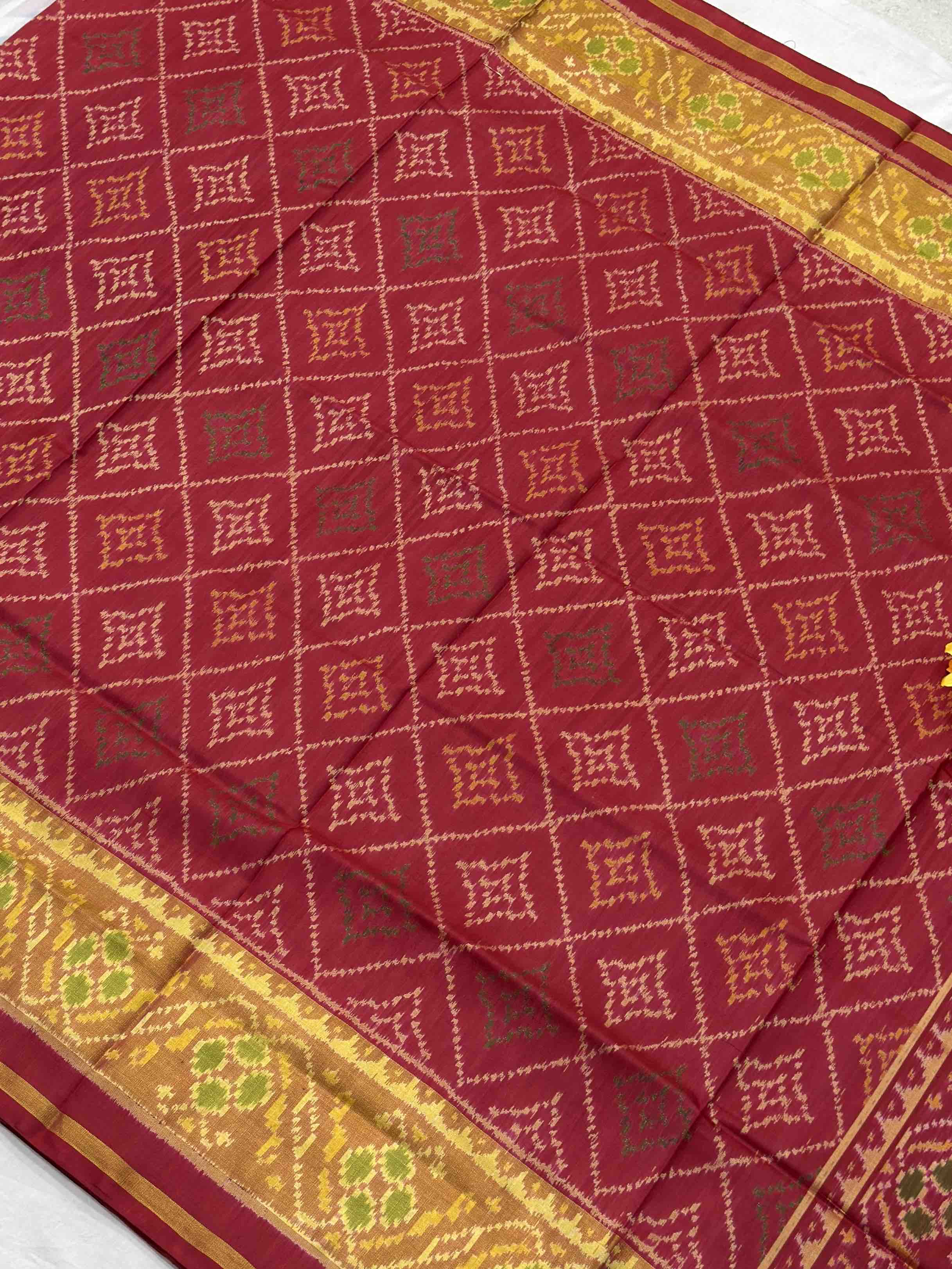 Maroonish red Chokhtabhat Rajkot Patola saree