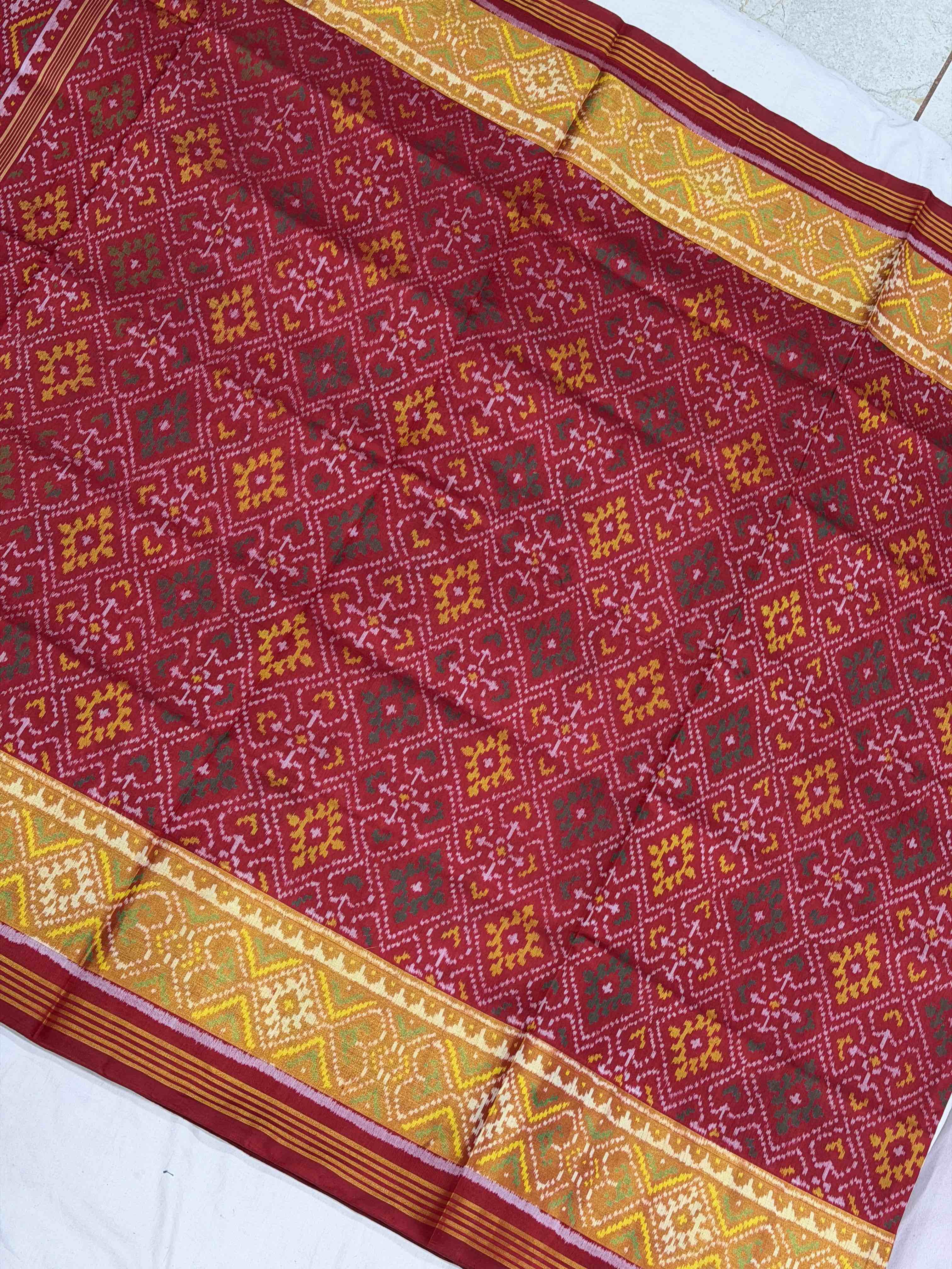 Red panchanda tissue border Patola Saree