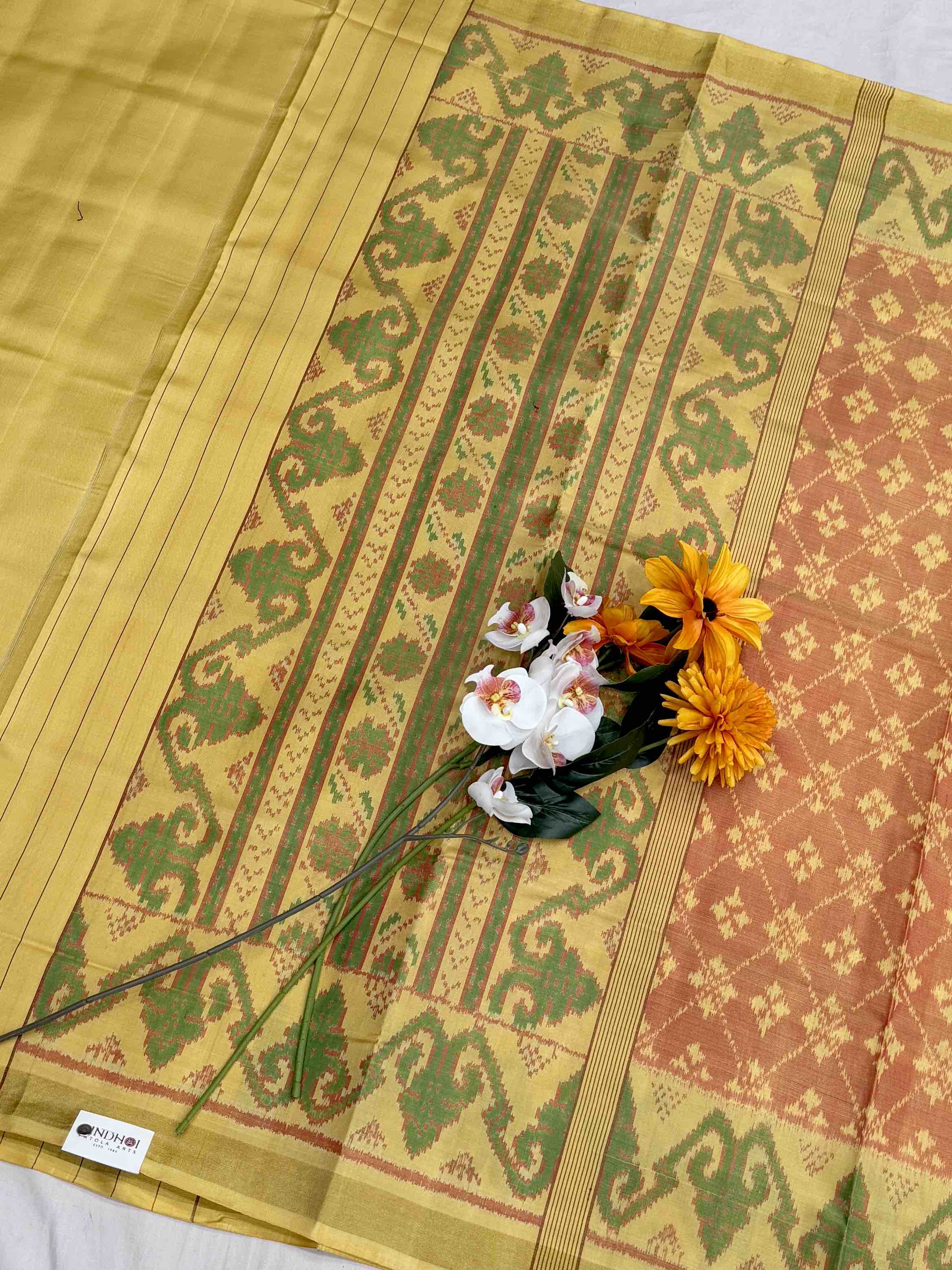 Light Yellow & Peach shade fancy Patola Saree