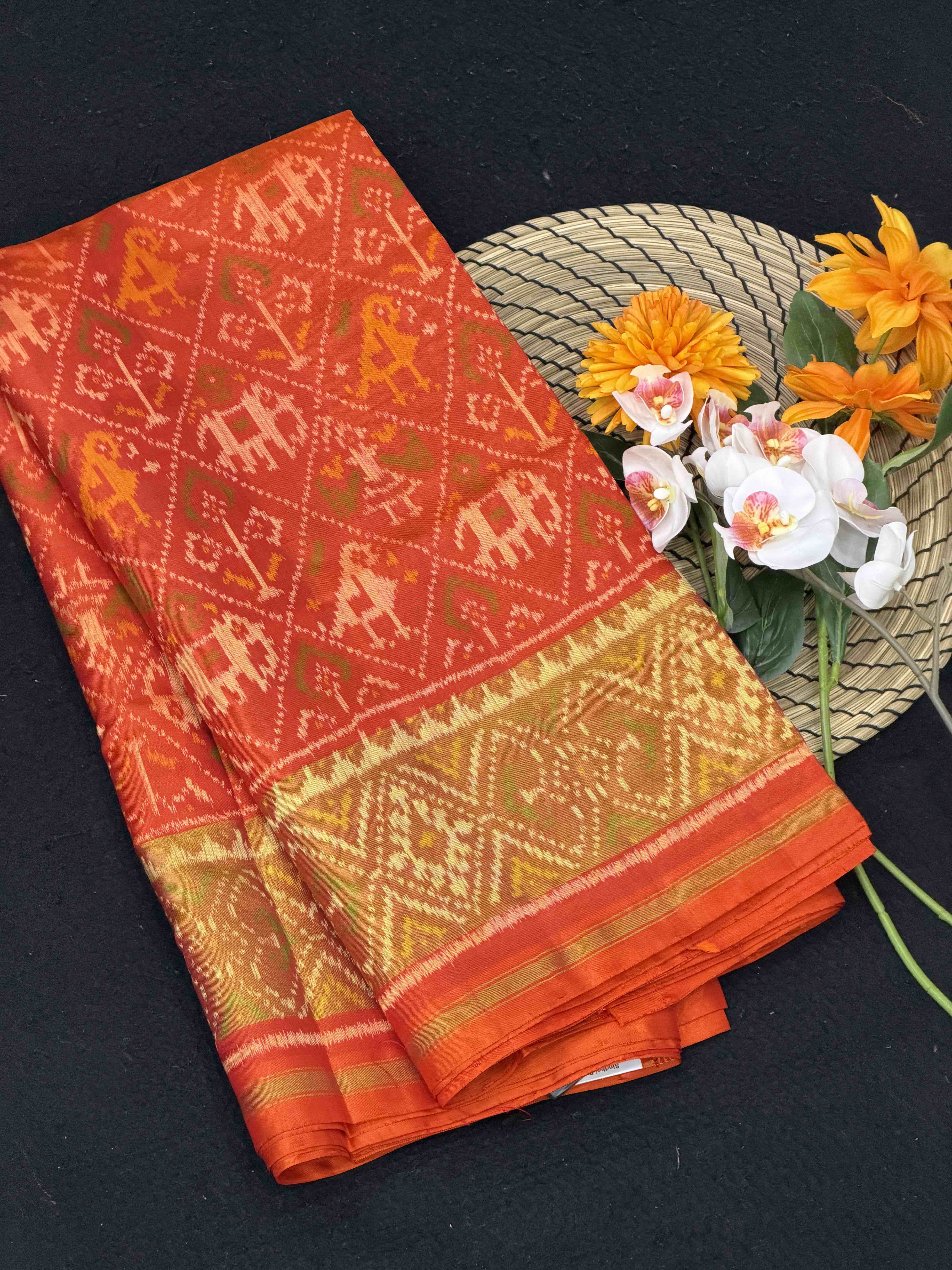 orange narikunj tissue border rajkot patola saree