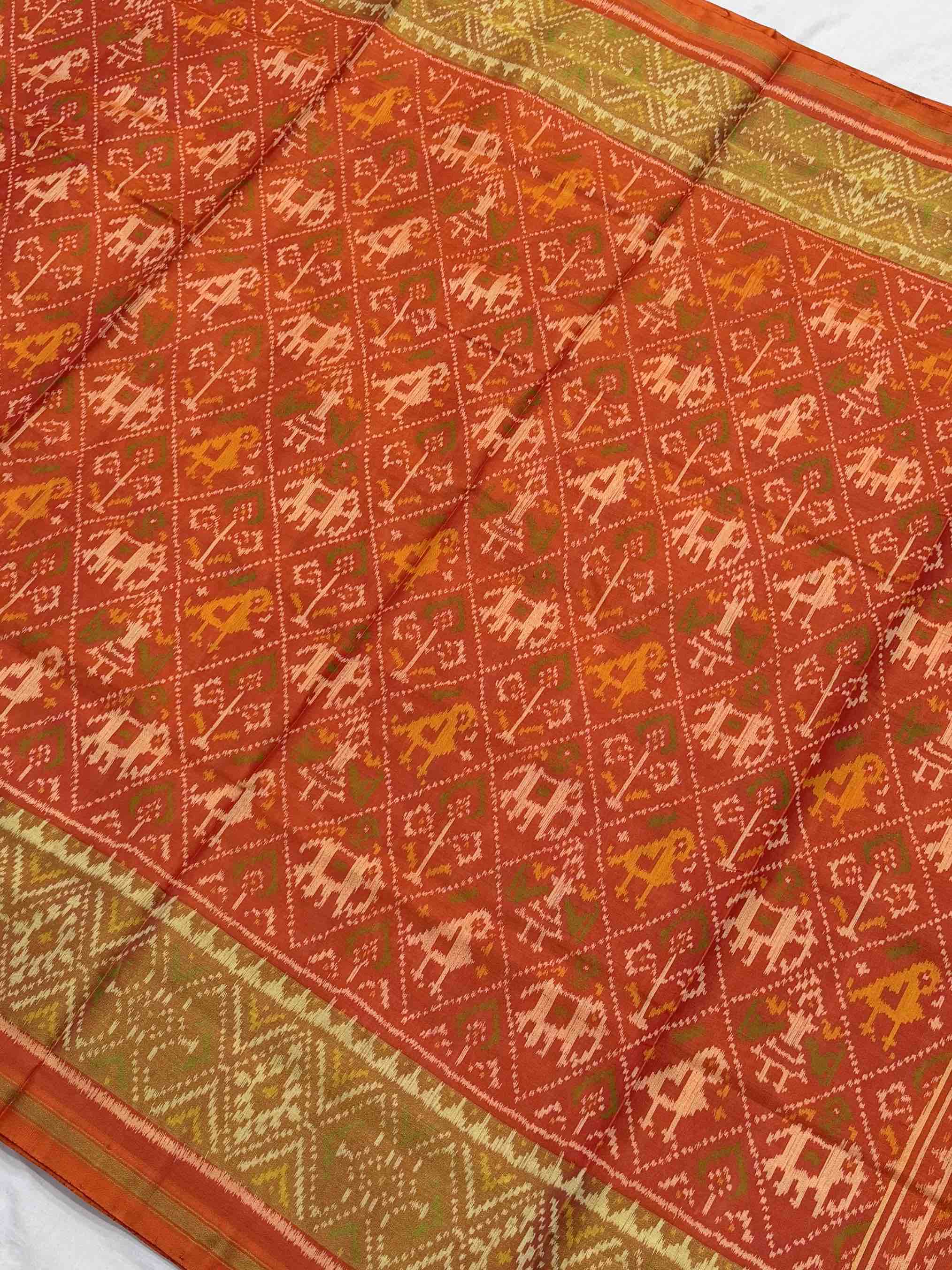orange narikunj tissue border rajkot patola saree