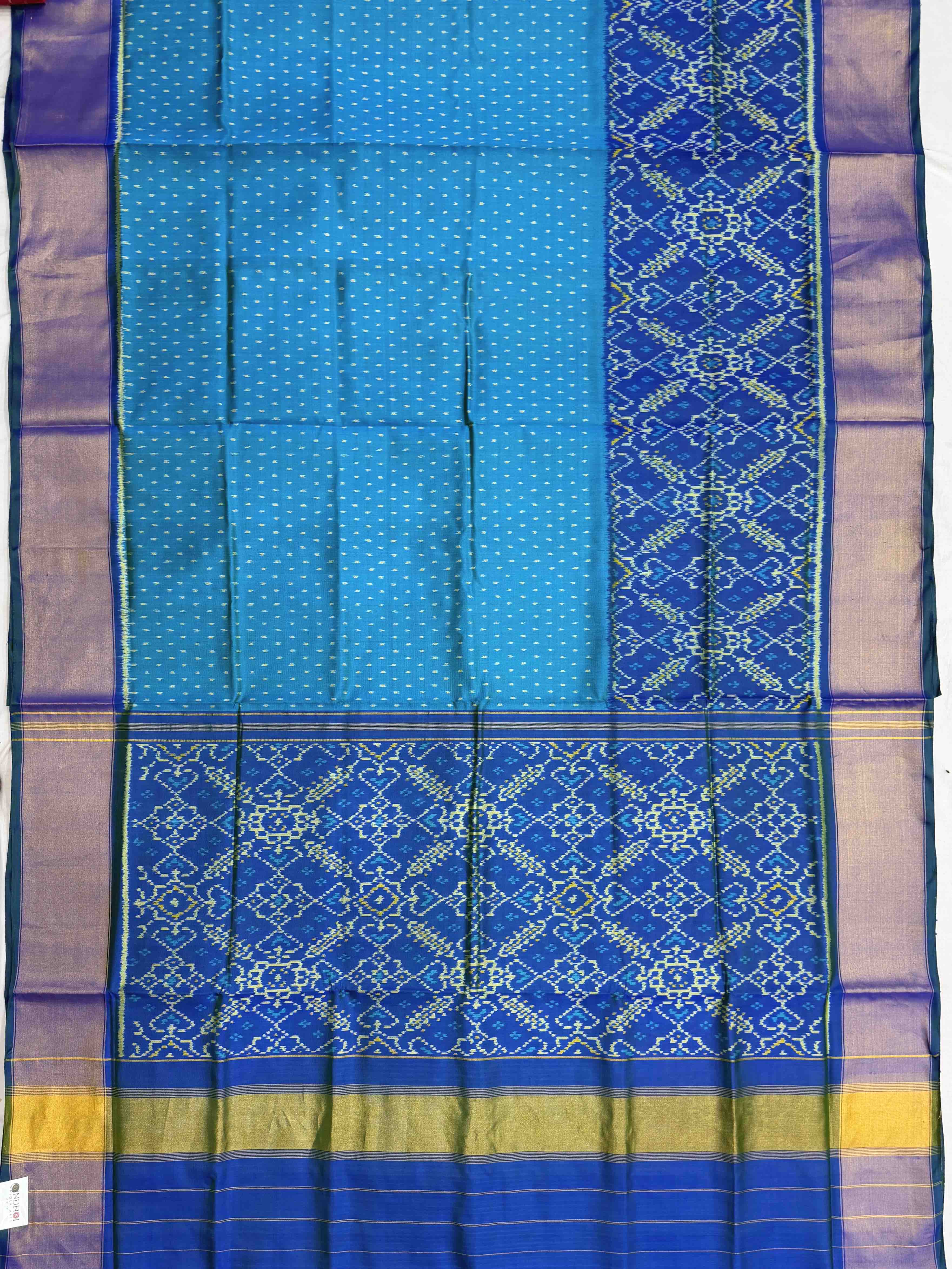Peacock blue skirt border Patola Saree