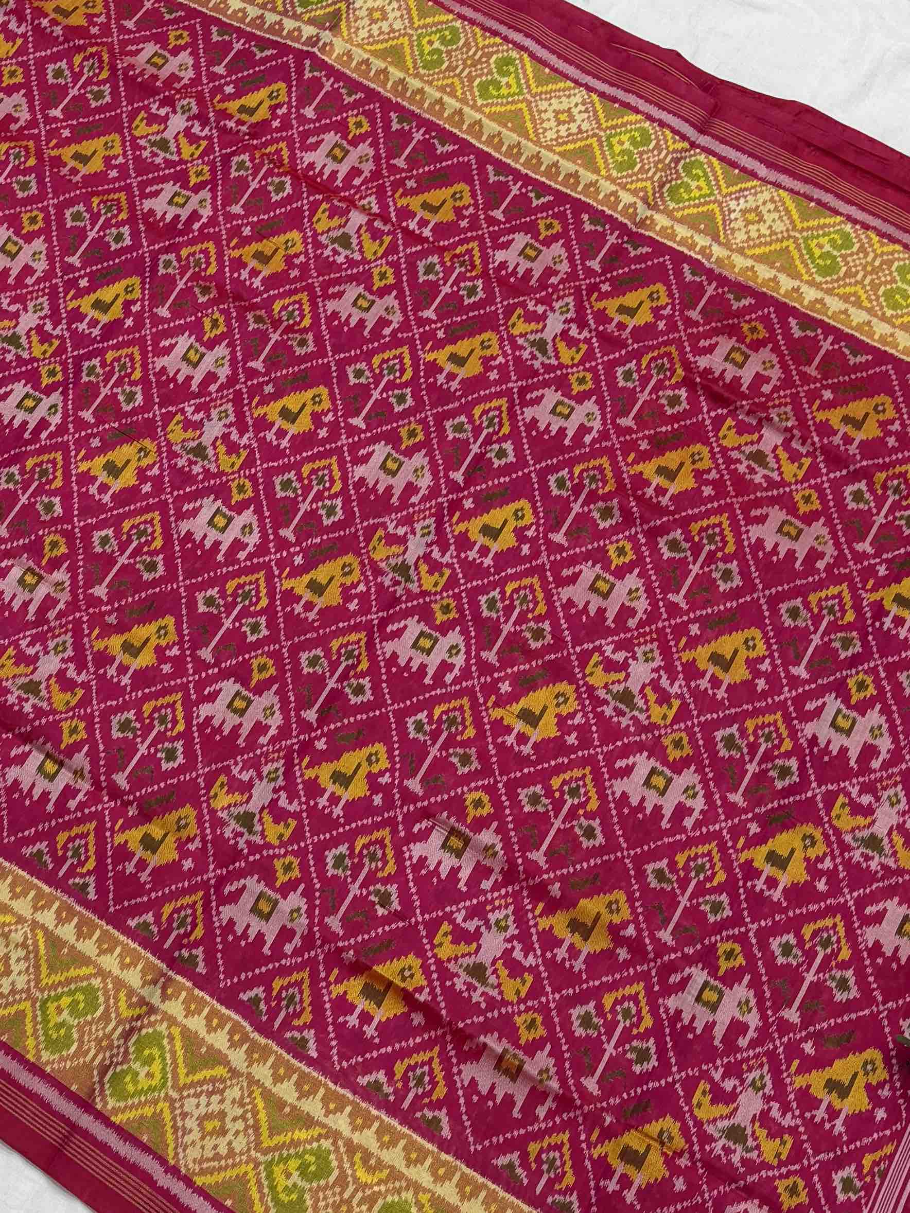Rani pink Narikunj Tissue Border Patola Saree