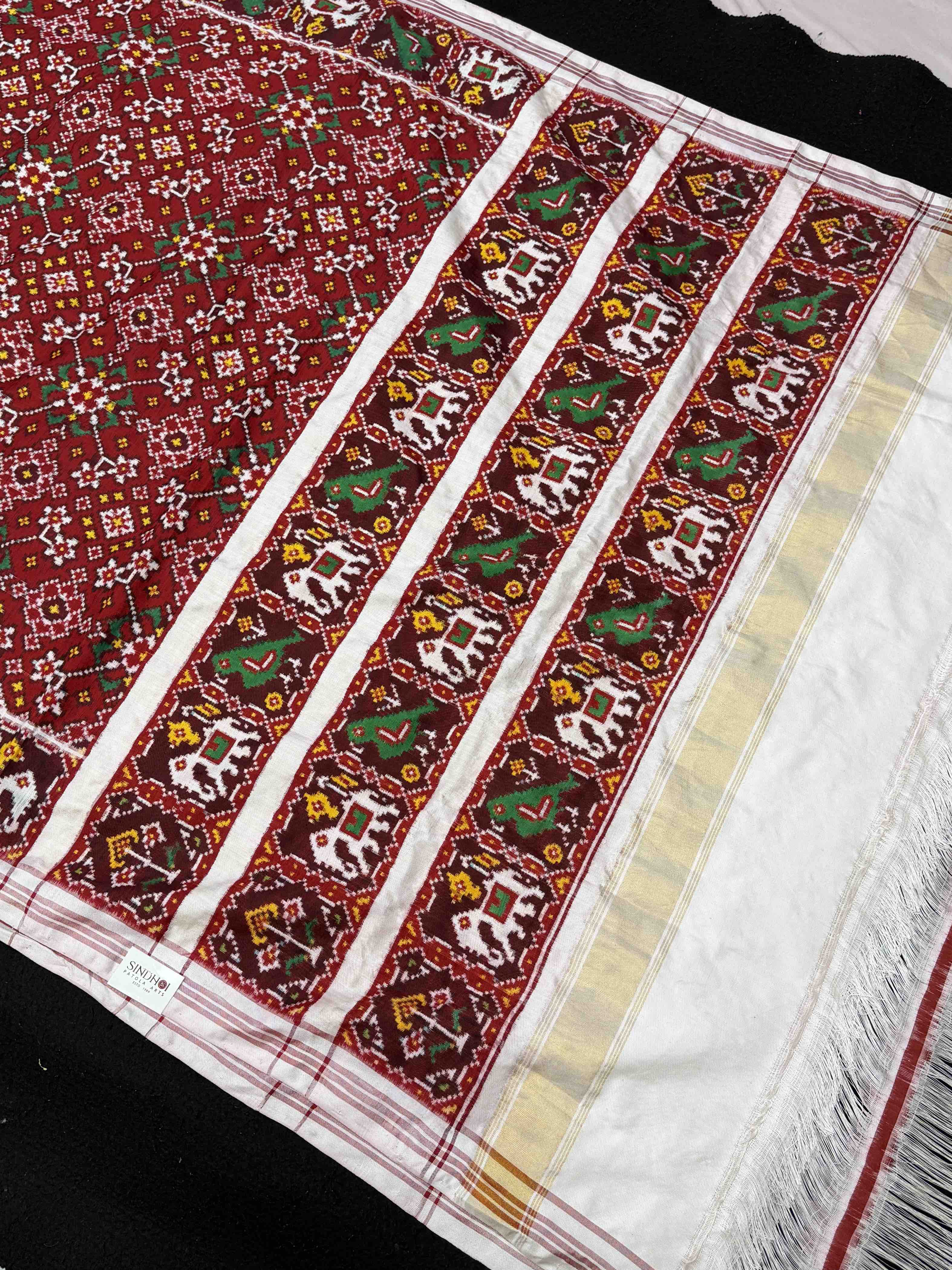 White & Red Navaratan Double Ikat Patola Saree