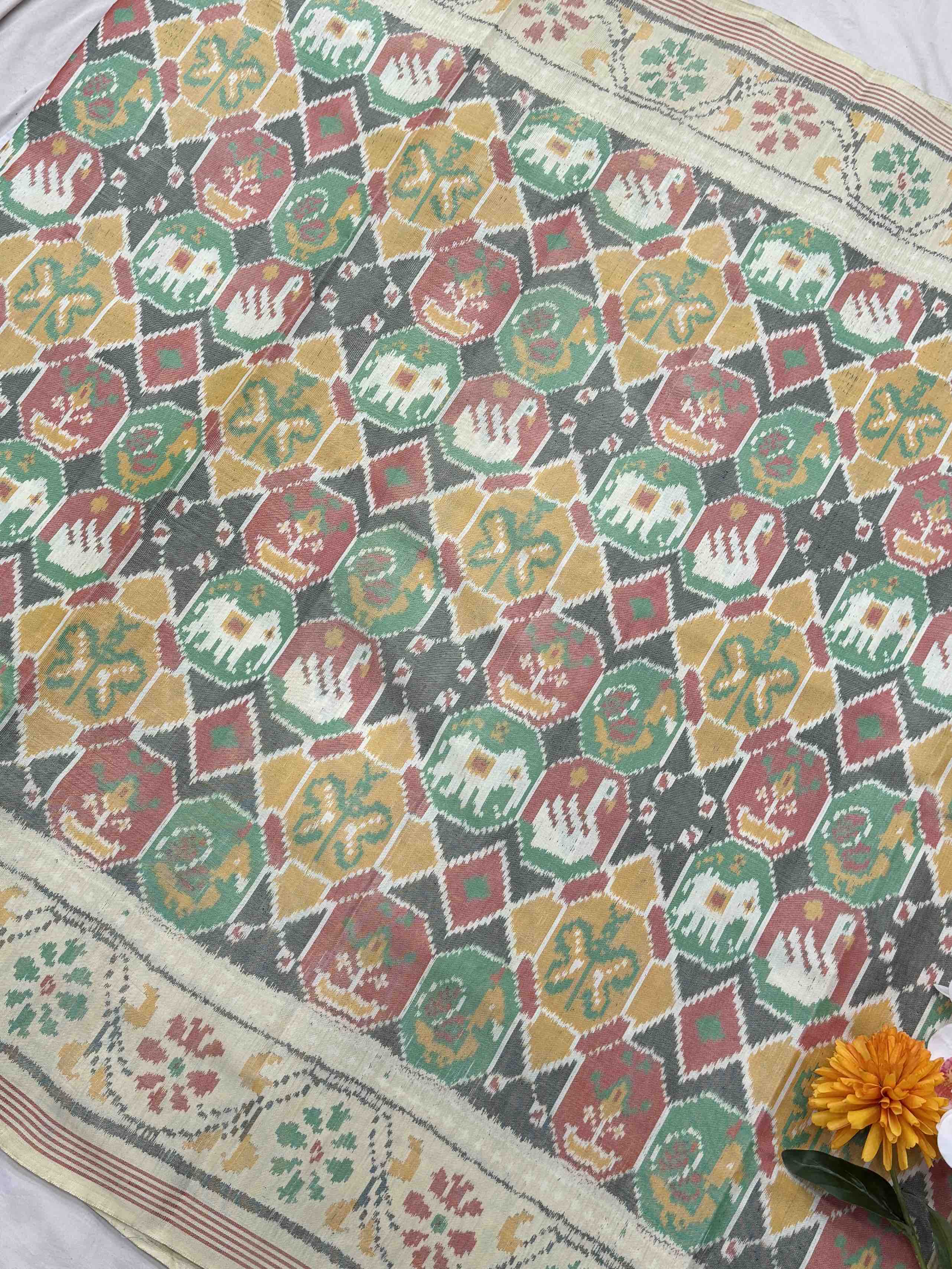 Cream with multi figure beige Single ikat Patola