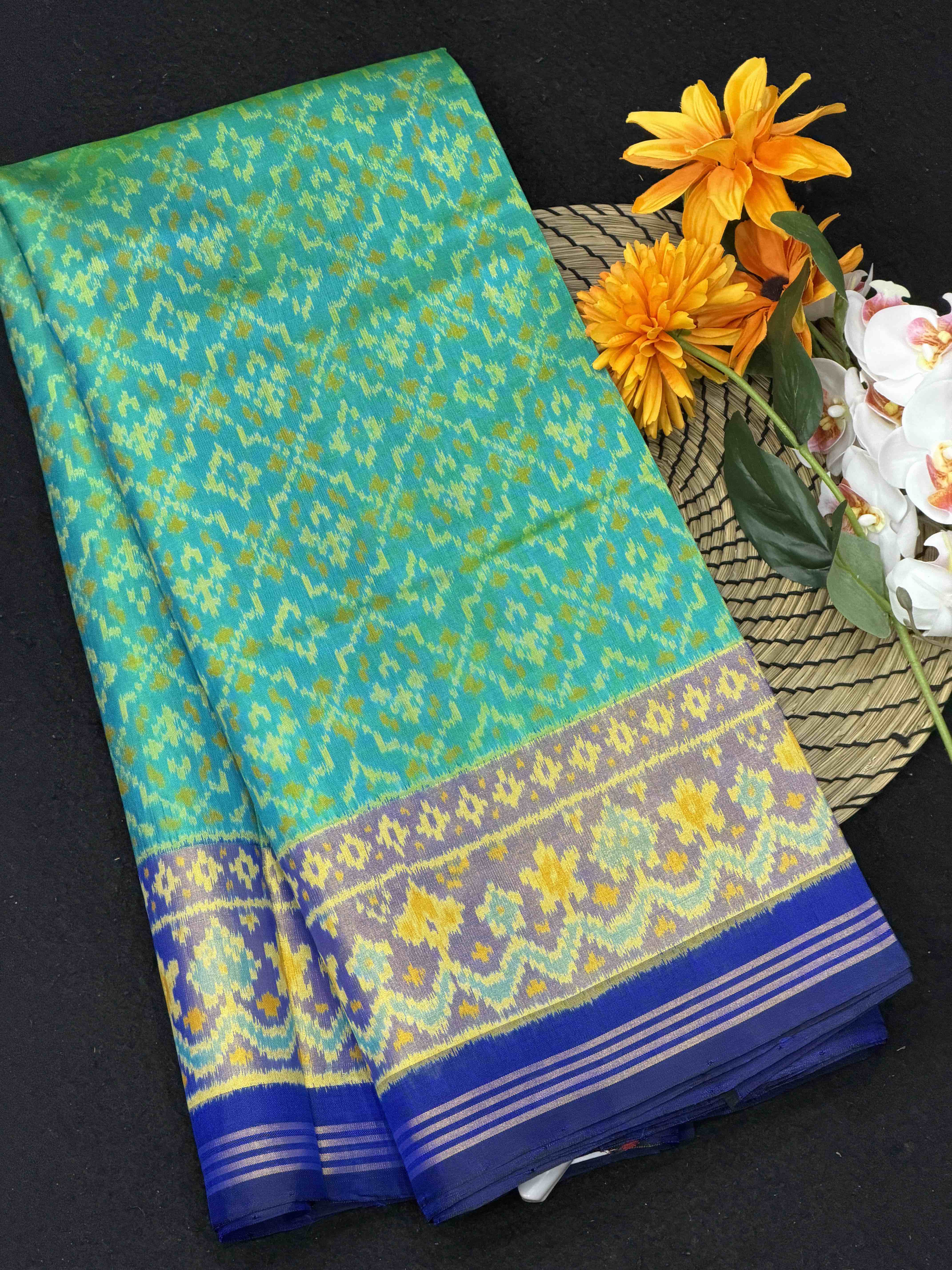 Blue & rama blue buttonful rajkot Patola Saree
