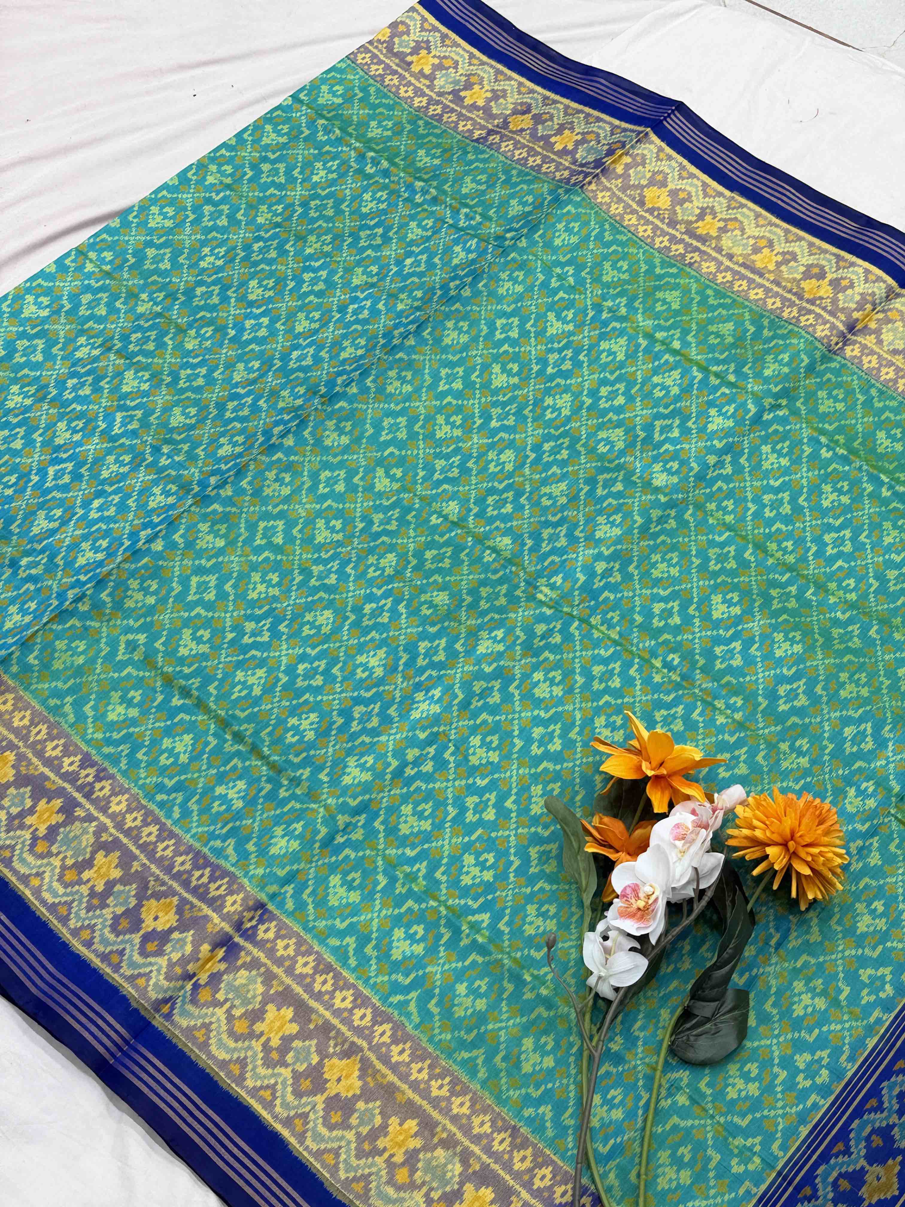 Blue & rama blue buttonful rajkot Patola Saree