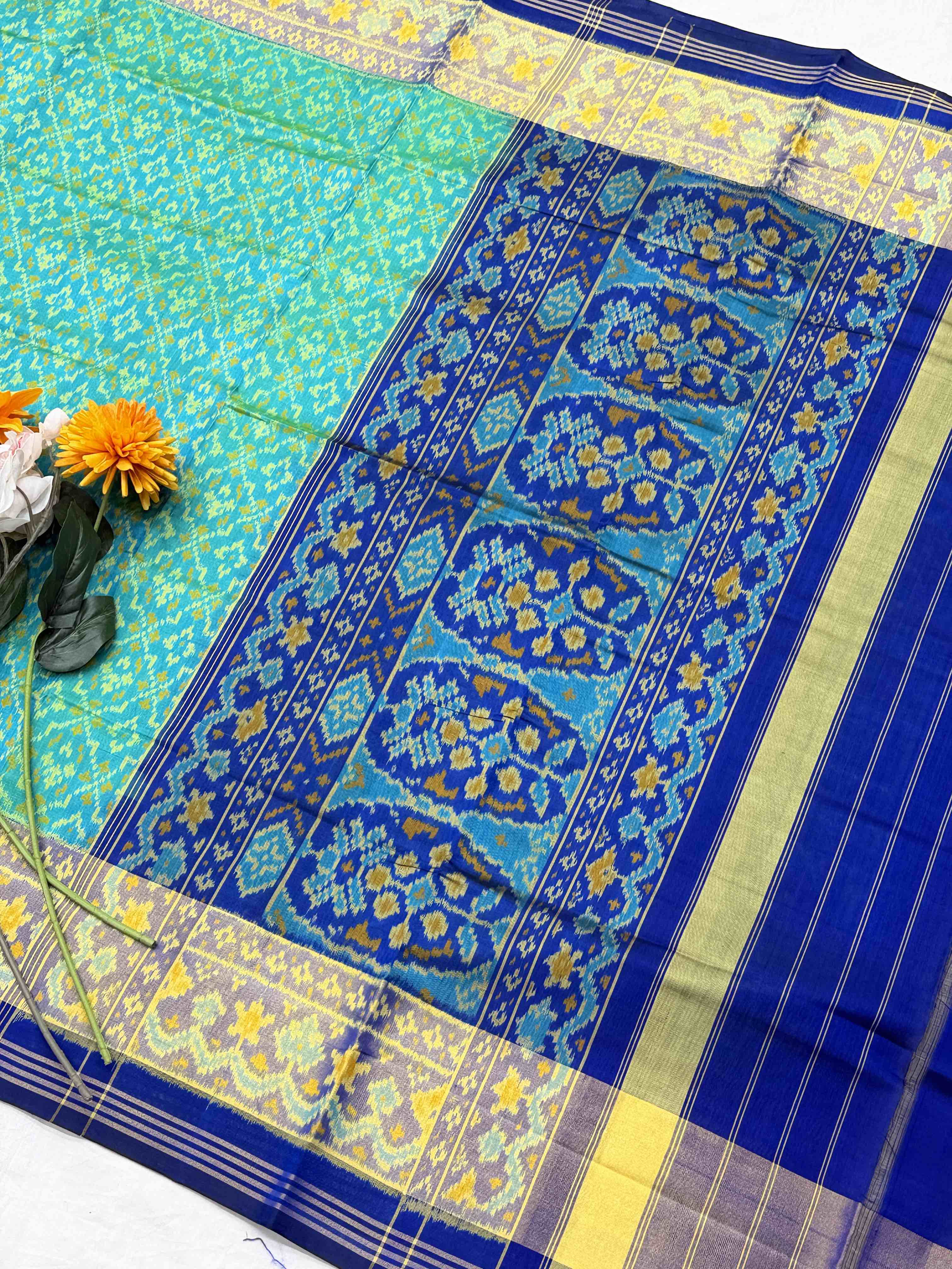 Blue & rama blue buttonful rajkot Patola Saree