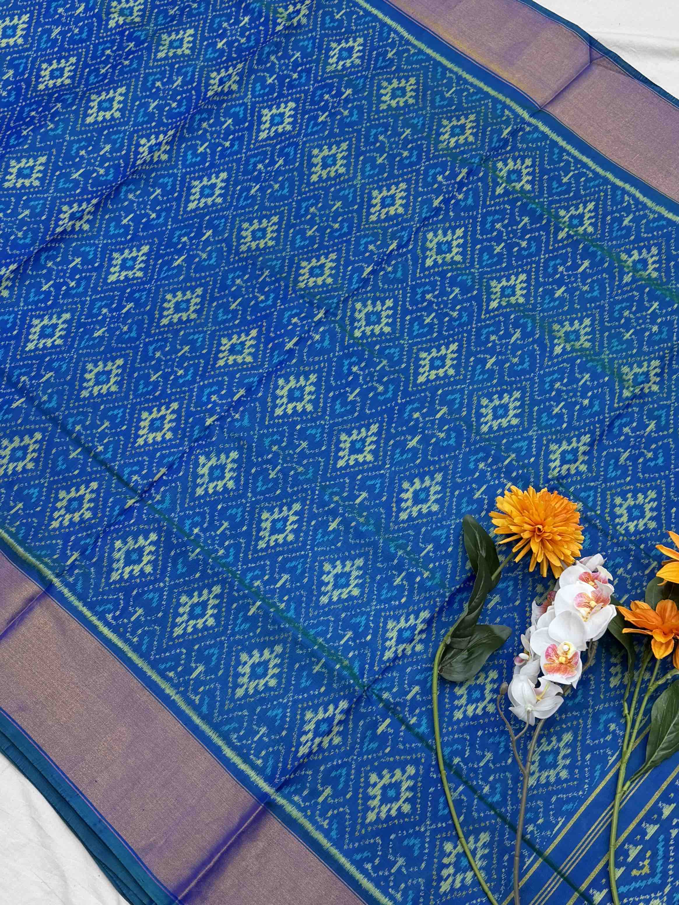Peacock Blue Broad tissue border Rajkot Patola Saree