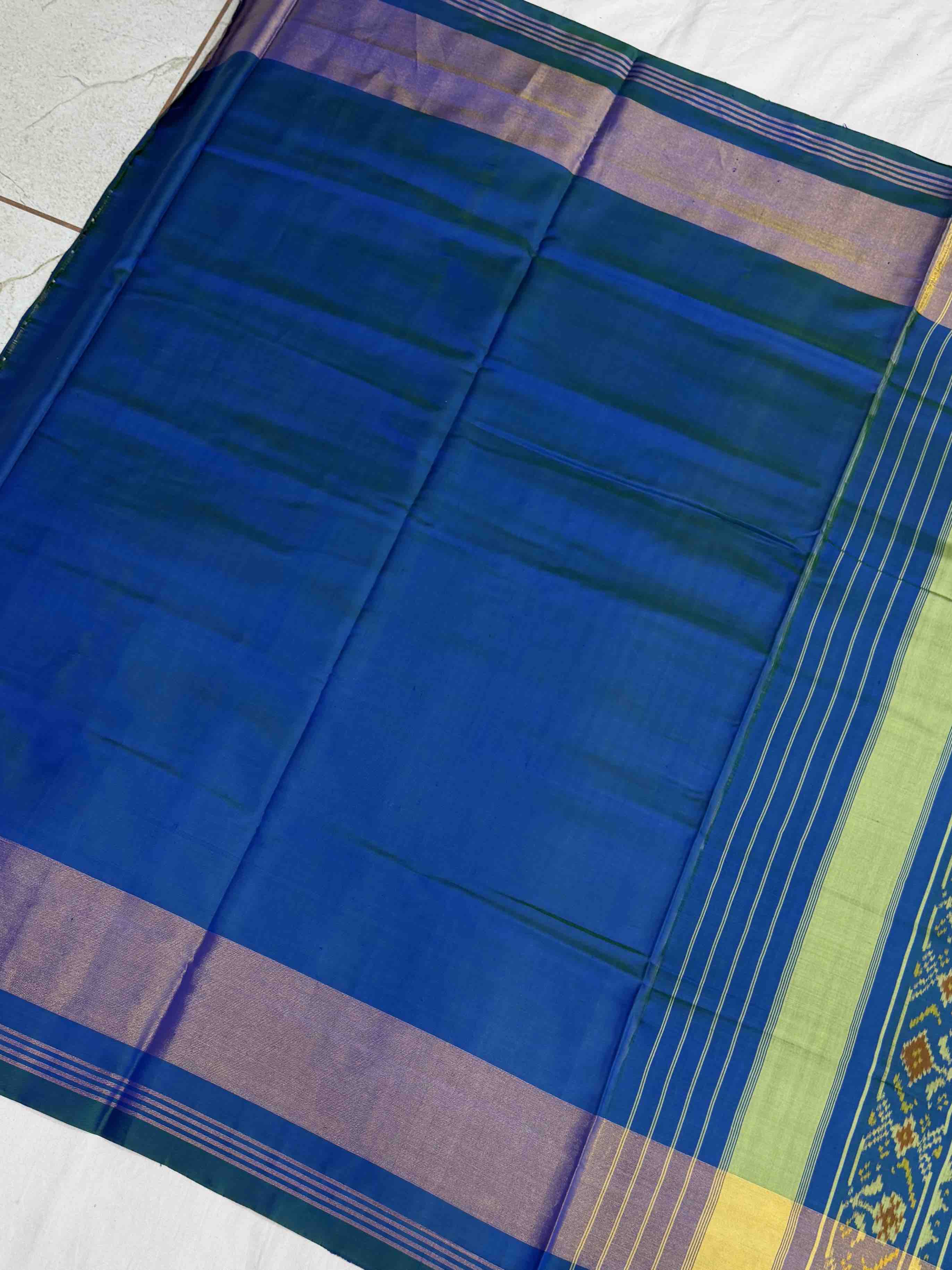 Peacock blue navarat tissue border Rajkot Patola Saree