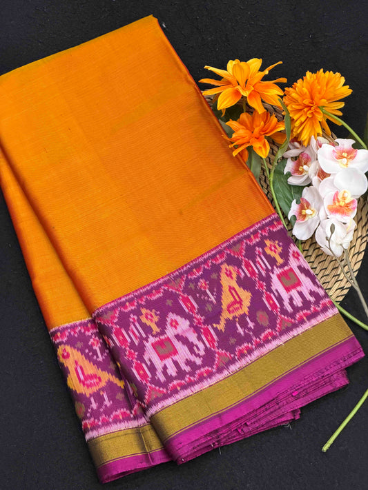 Magenta Narikunj Pallu & plain orange gala border Patola Saree