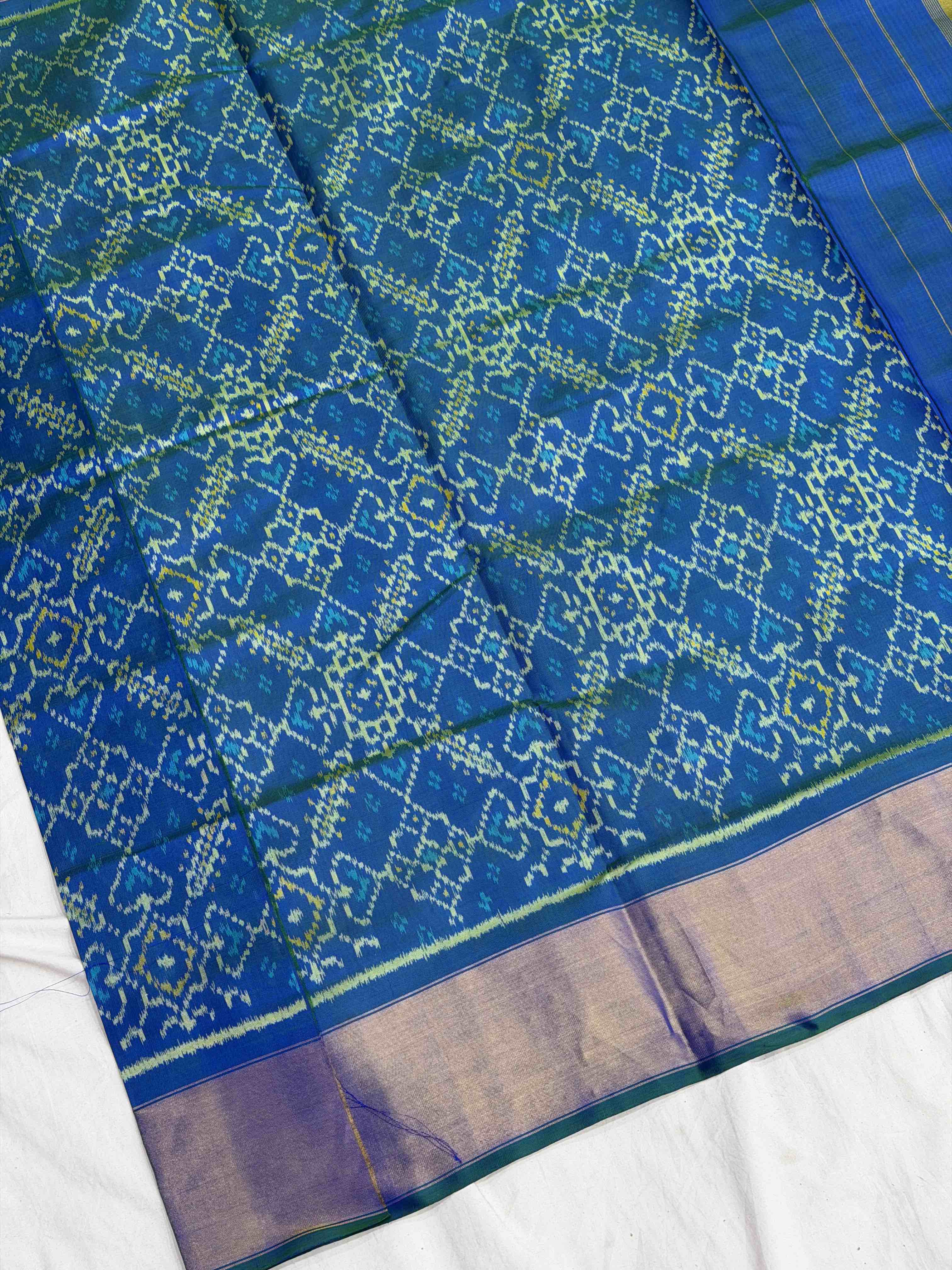 Peacock blue & orange skirt border Rajkot Patola Saree