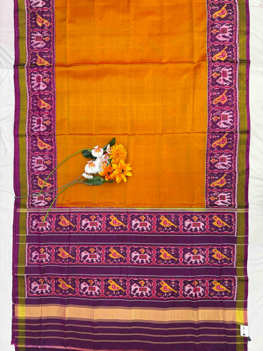 Magenta Narikunj Pallu & plain orange gala border Patola Saree