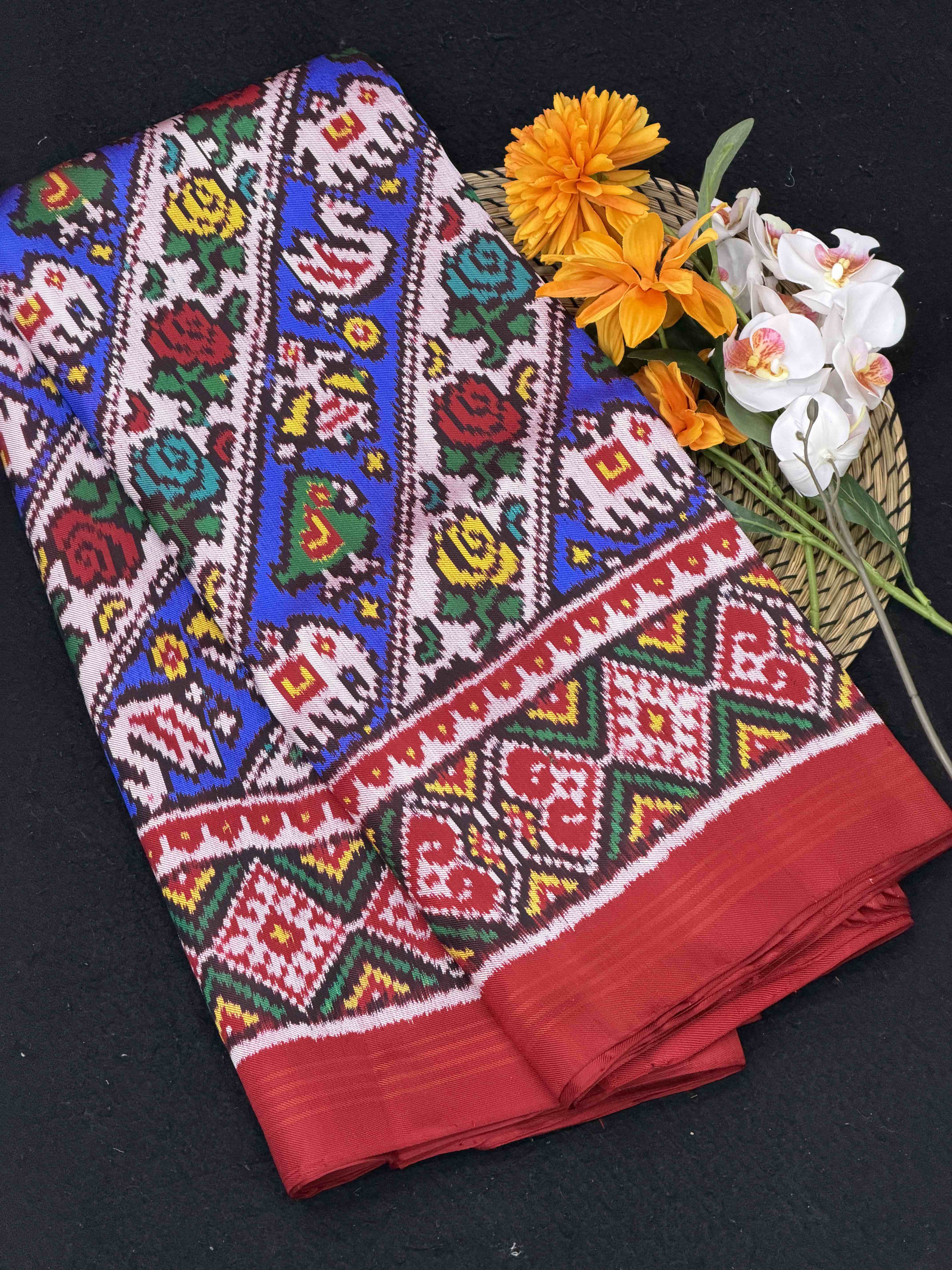 Narikunj with rose petals multicolour twill Patola Saree