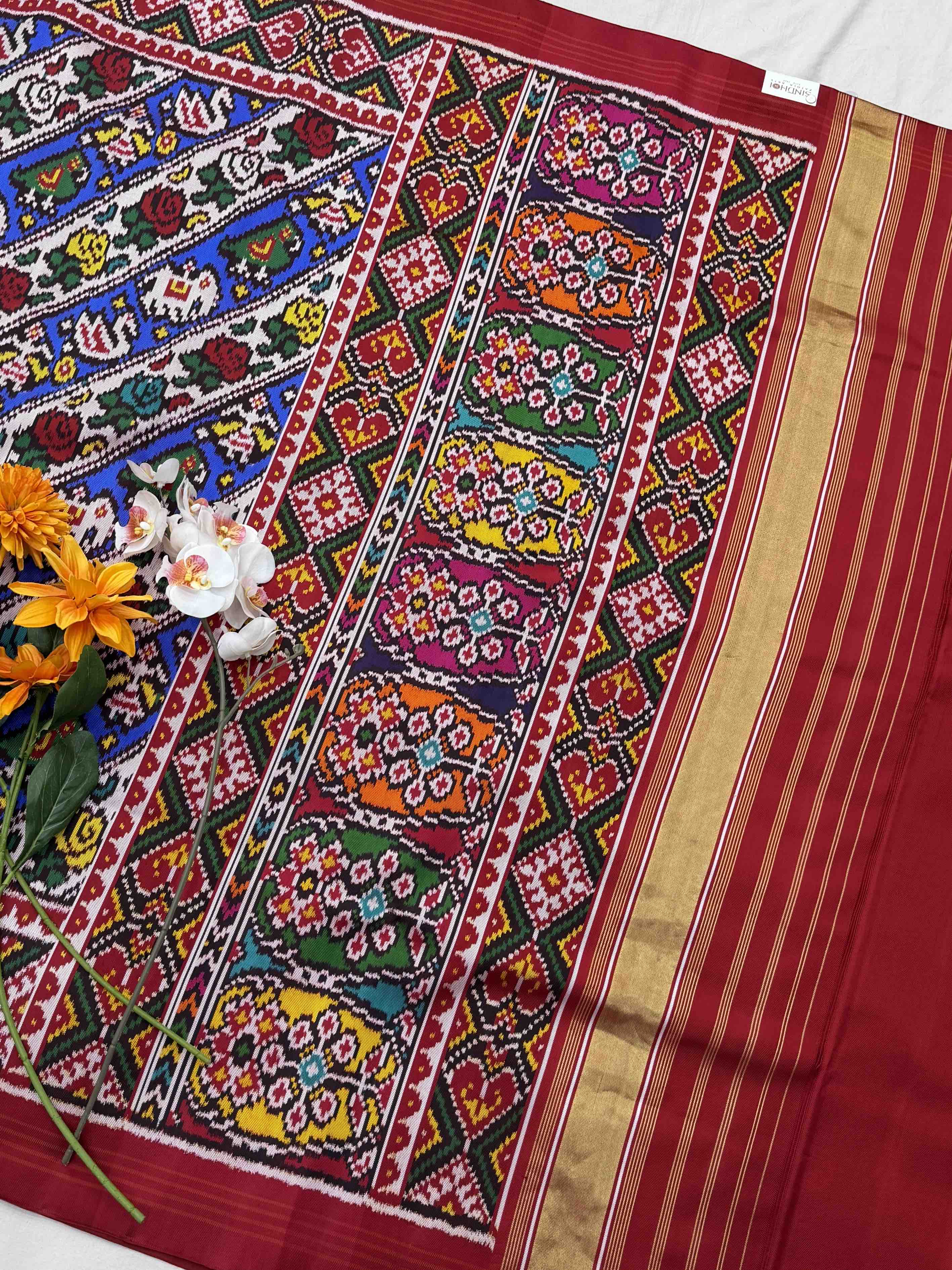 Narikunj with rose petals multicolour twill Patola Saree