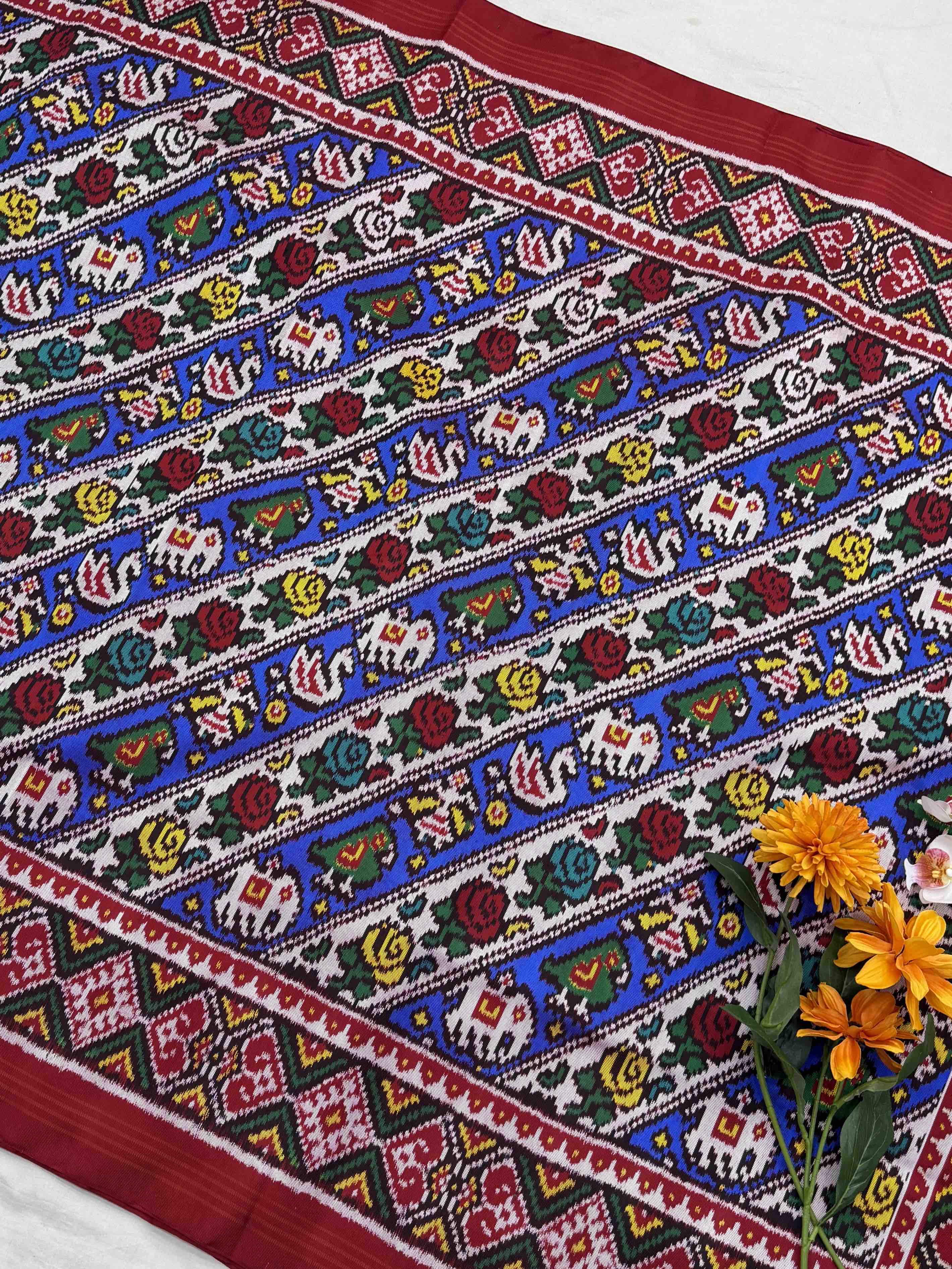 Narikunj with rose petals multicolour twill Patola Saree