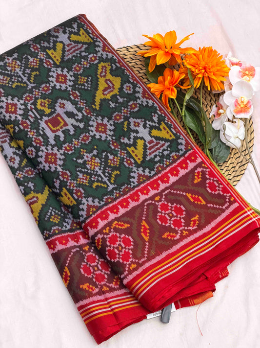 Maroon & dark green Sankli Narikunj Patola Saree