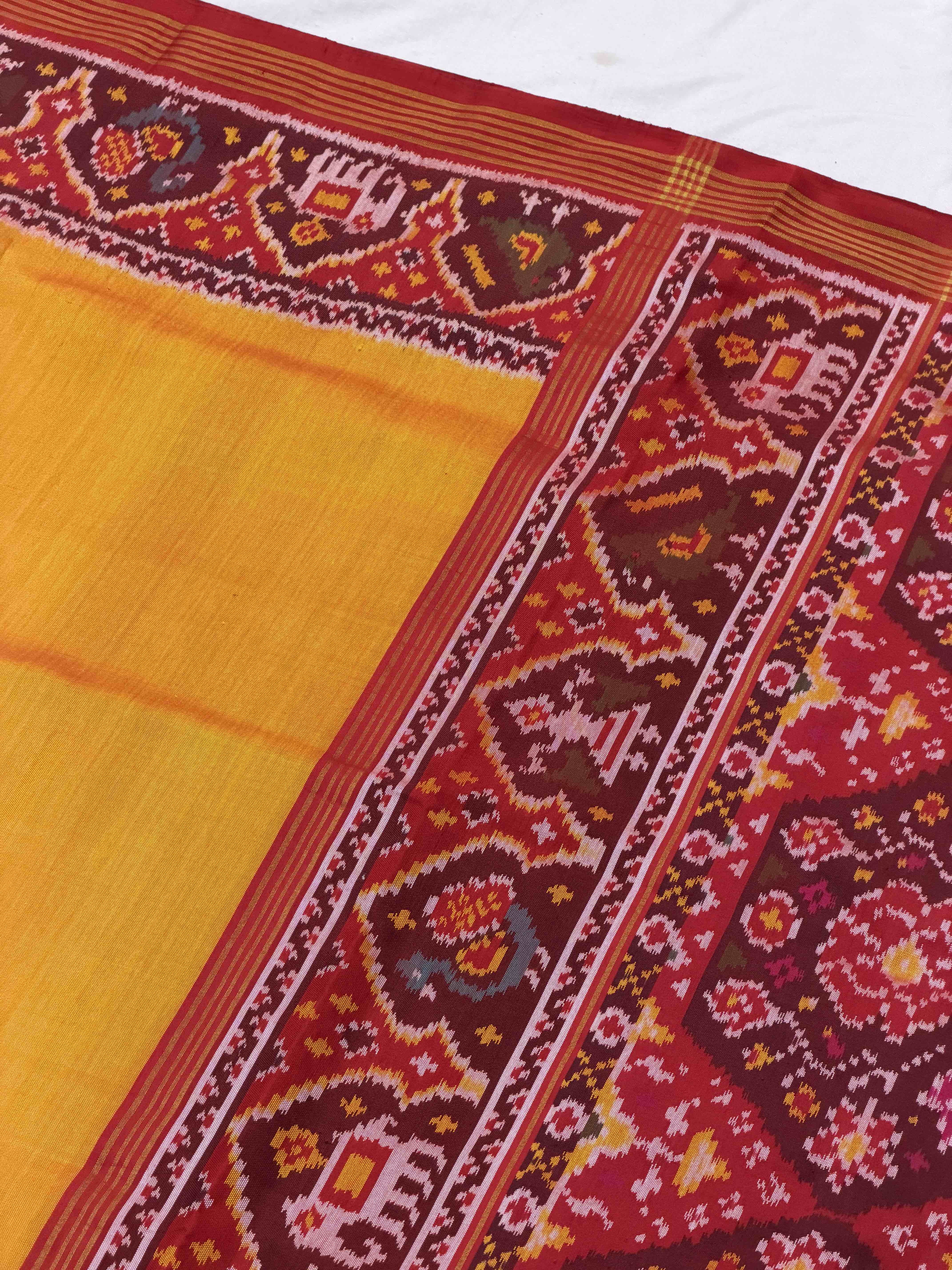 Red & mustered Plain Gala Border Patola with Navaratn design blouse