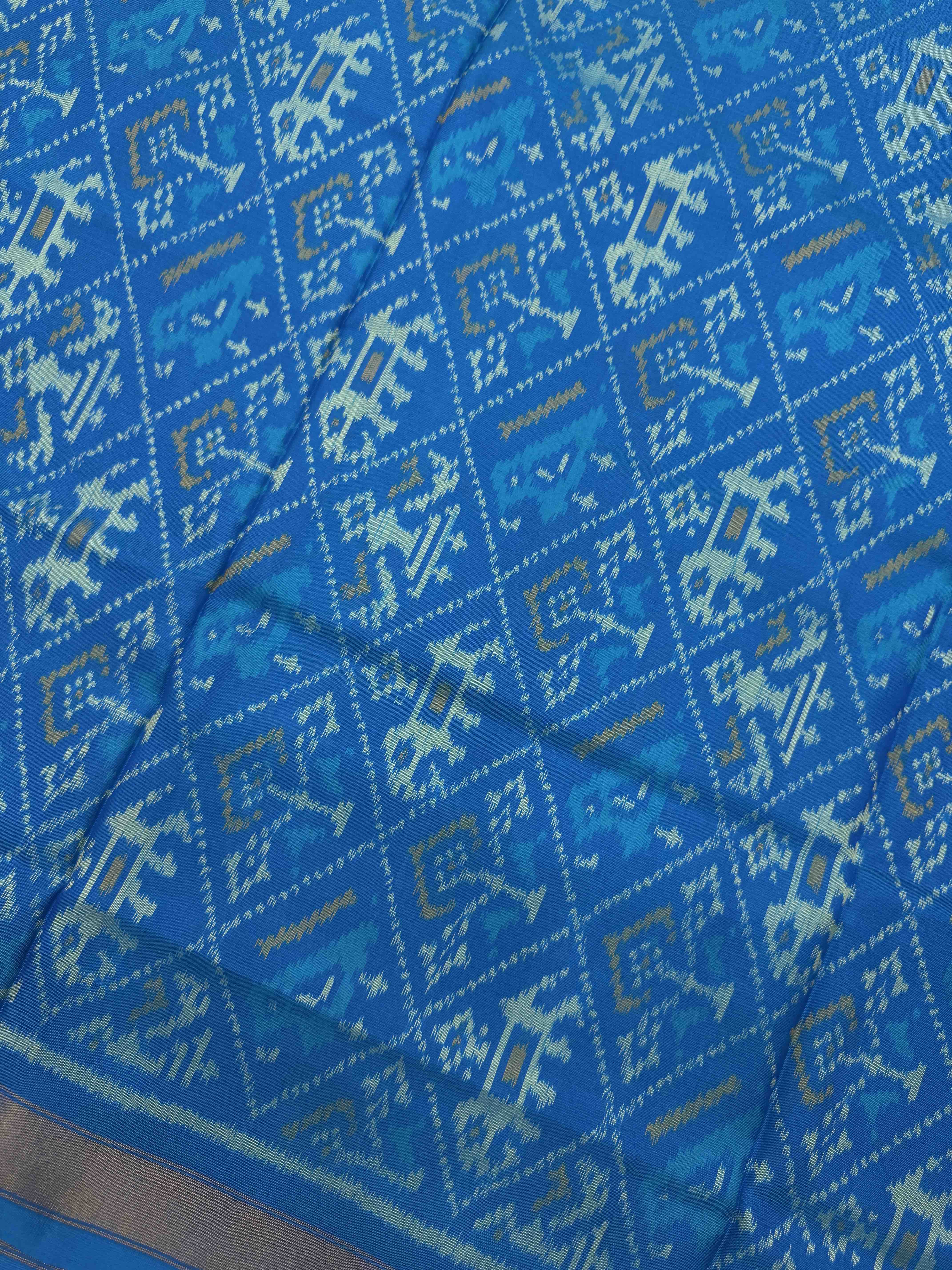 Sky Blue Narikunj with Zig zag Linging Patola Dress