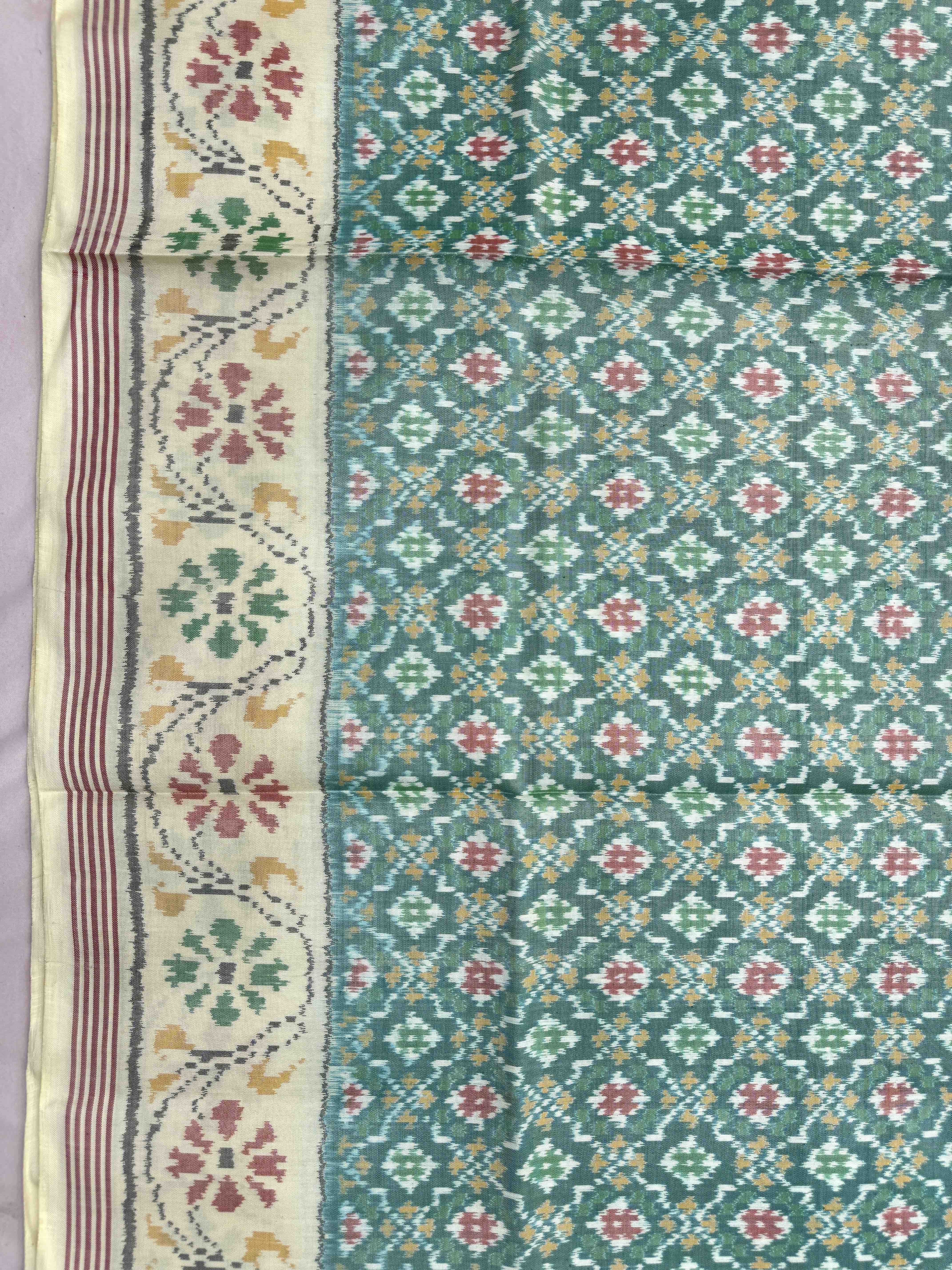 Off White & Sea Green Buttonful Single Ikat Patan Patola Saree