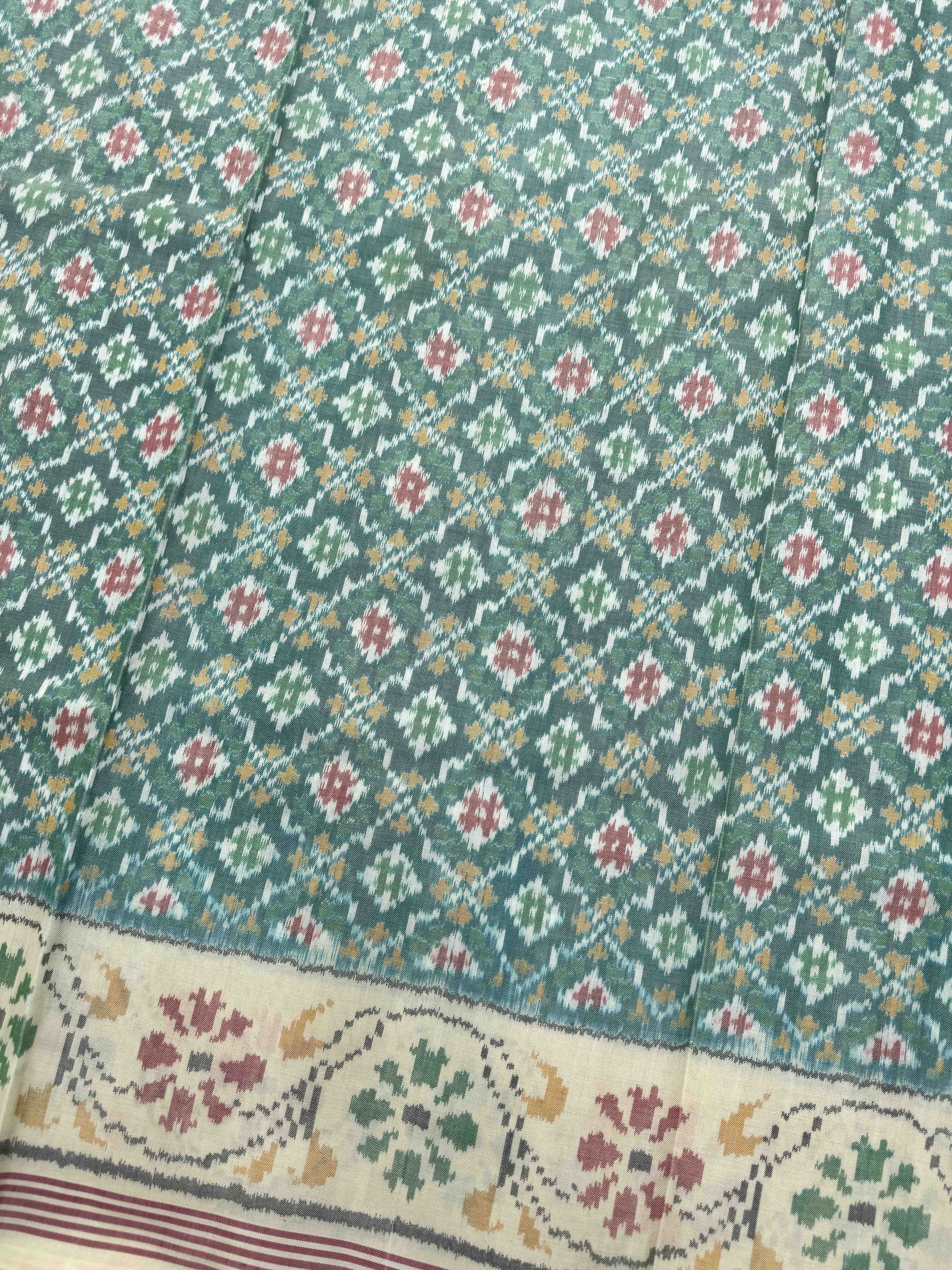 Off White & Light Green Buttonful Single Ikat Patan Patola Saree
